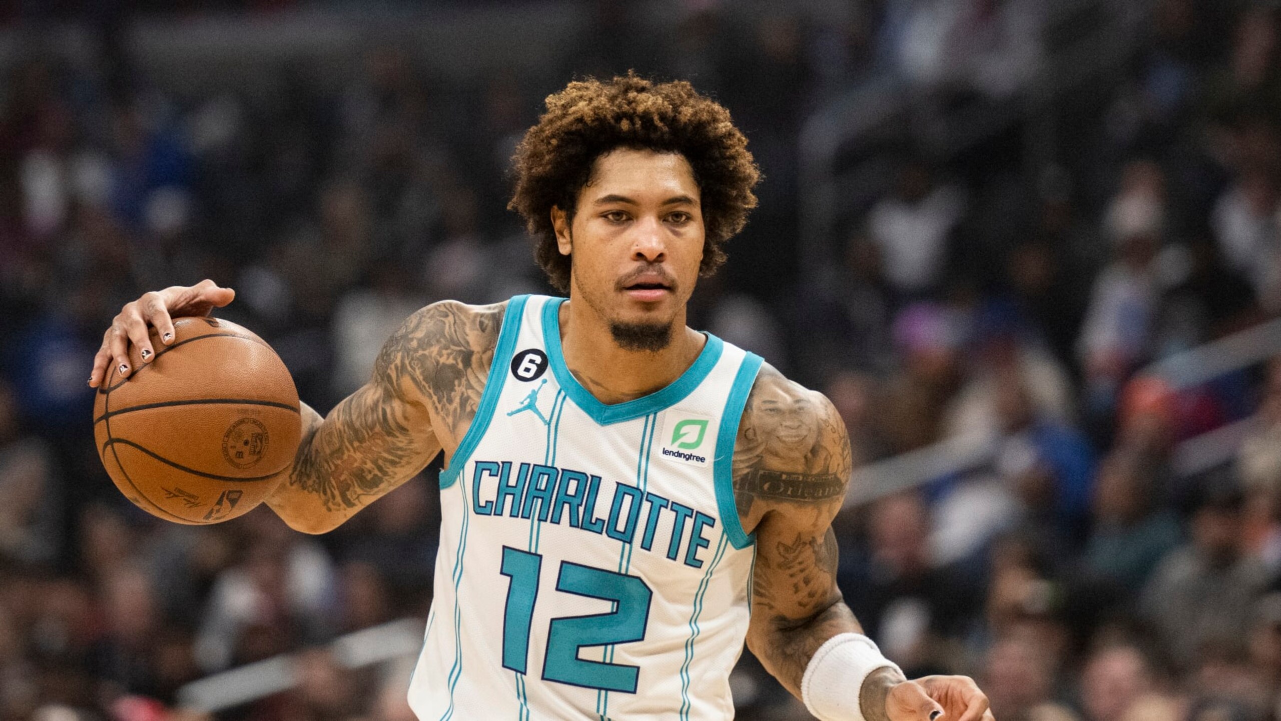 Charlotte Hornets guard Kelly Oubre Jr. (12) handles the ball during the first half of an NBA basketball game against the Los Angeles Clippers in Los Angeles Wednesday, Dec. 21, 2022. (AP Photo/Kyusung Gong) Charlotte Hornets guard Kelly Oubre Jr. (12) handles the ball during the first half of an NBA basketball game against the Los Angeles Clippers in Los Angeles Wednesday, Dec. 21, 2022. (AP Photo/Kyusung Gong)