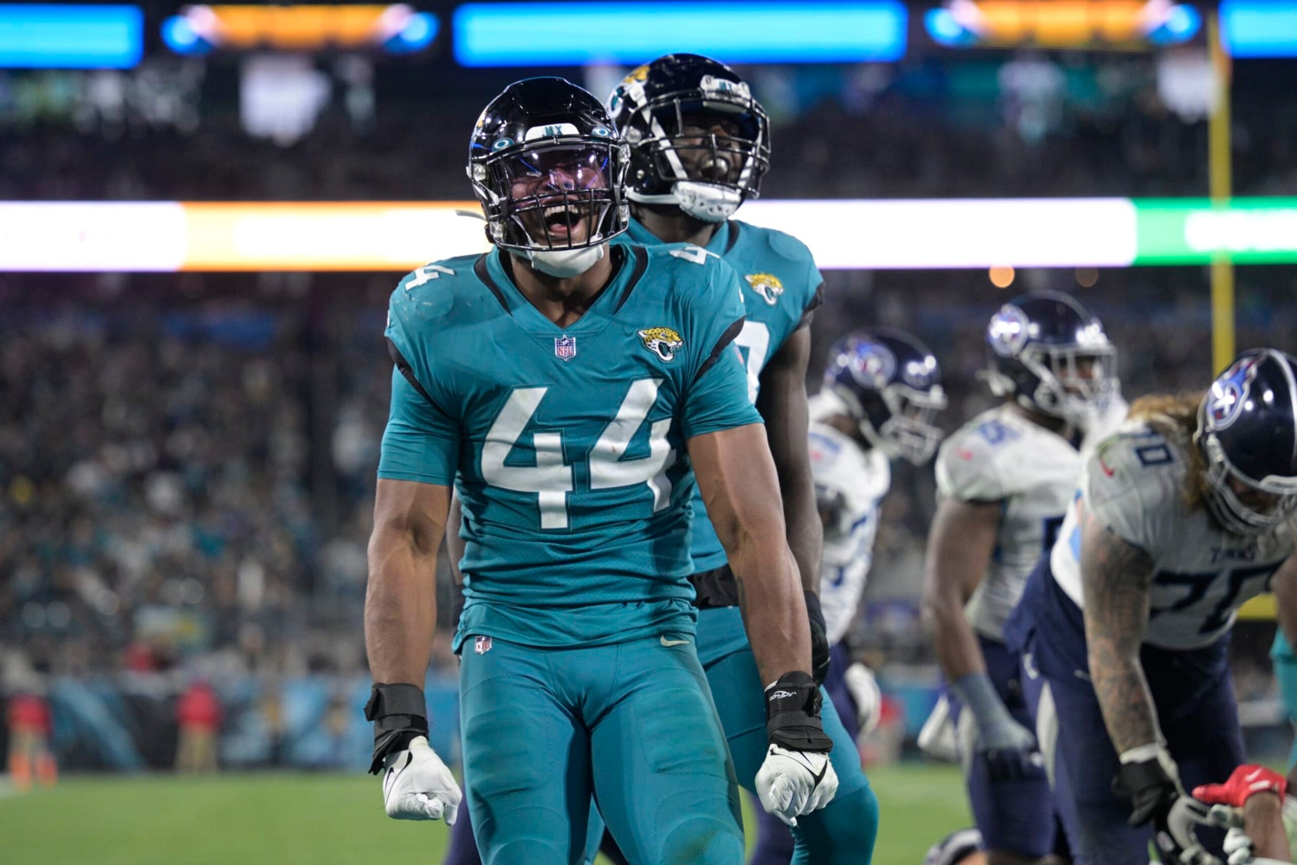 Jacksonville Jaguars quarterback E.J. Perry (4) reacts after a defensive stop in the second half of an NFL football game against the Tennessee Titans, Saturday, Jan. 7, 2023, in Jacksonville, Fla. (AP Photo/Phelan M. Ebenhack) Jacksonville Jaguars quarterback E.J. Perry (4) reacts after a defensive stop in the second half of an NFL football game against the Tennessee Titans, Saturday, Jan. 7, 2023, in Jacksonville, Fla. (AP Photo/Phelan M. Ebenhack)