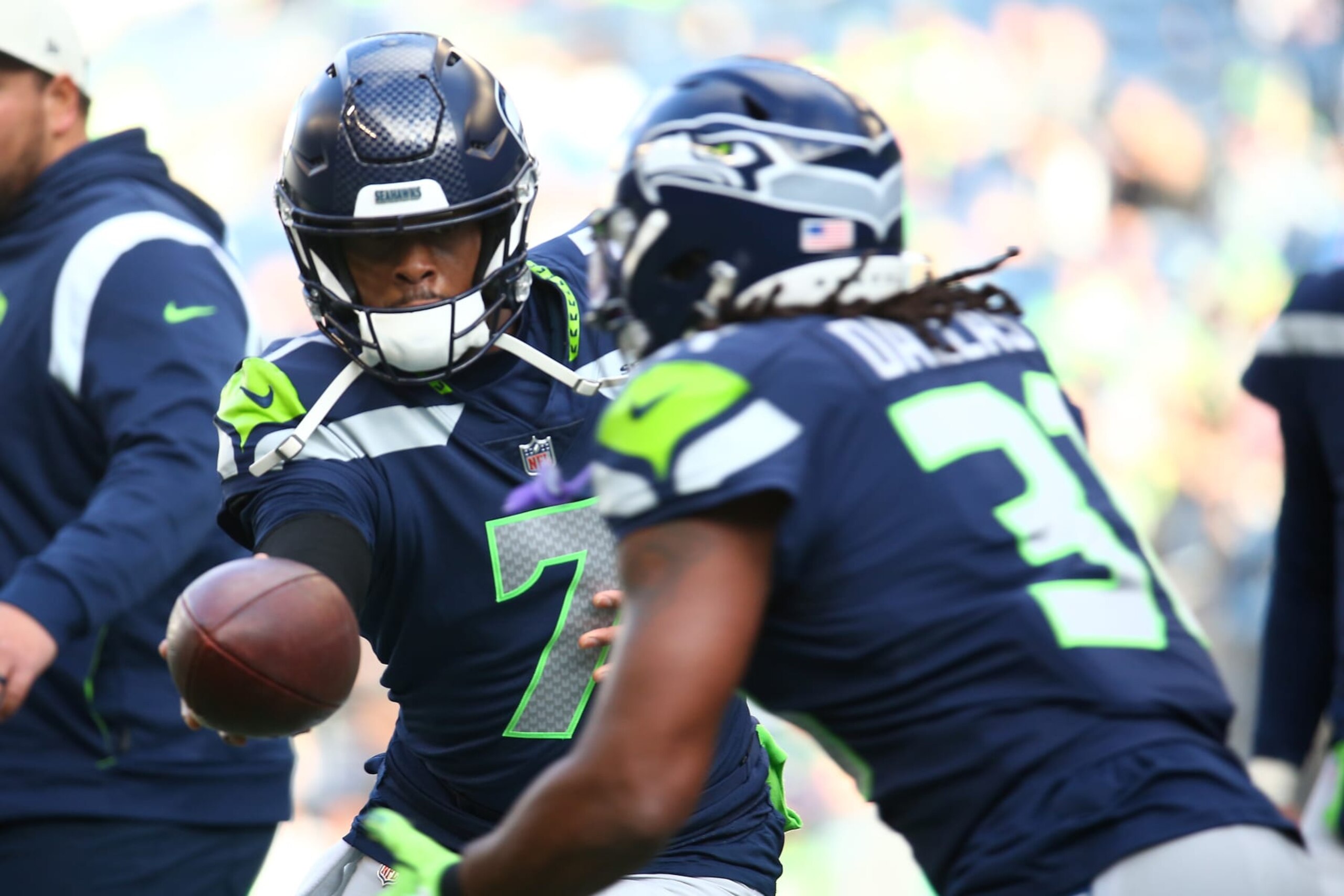 SEATTLE, WASHINGTON - JANUARY 01: Geno Smith #7 of the Seattle Seahawks warms up prior to a game against the New York Jets at Lumen Field on January 01, 2023 in Seattle, Washington. (Photo by Lindsey Wasson/Getty Images)