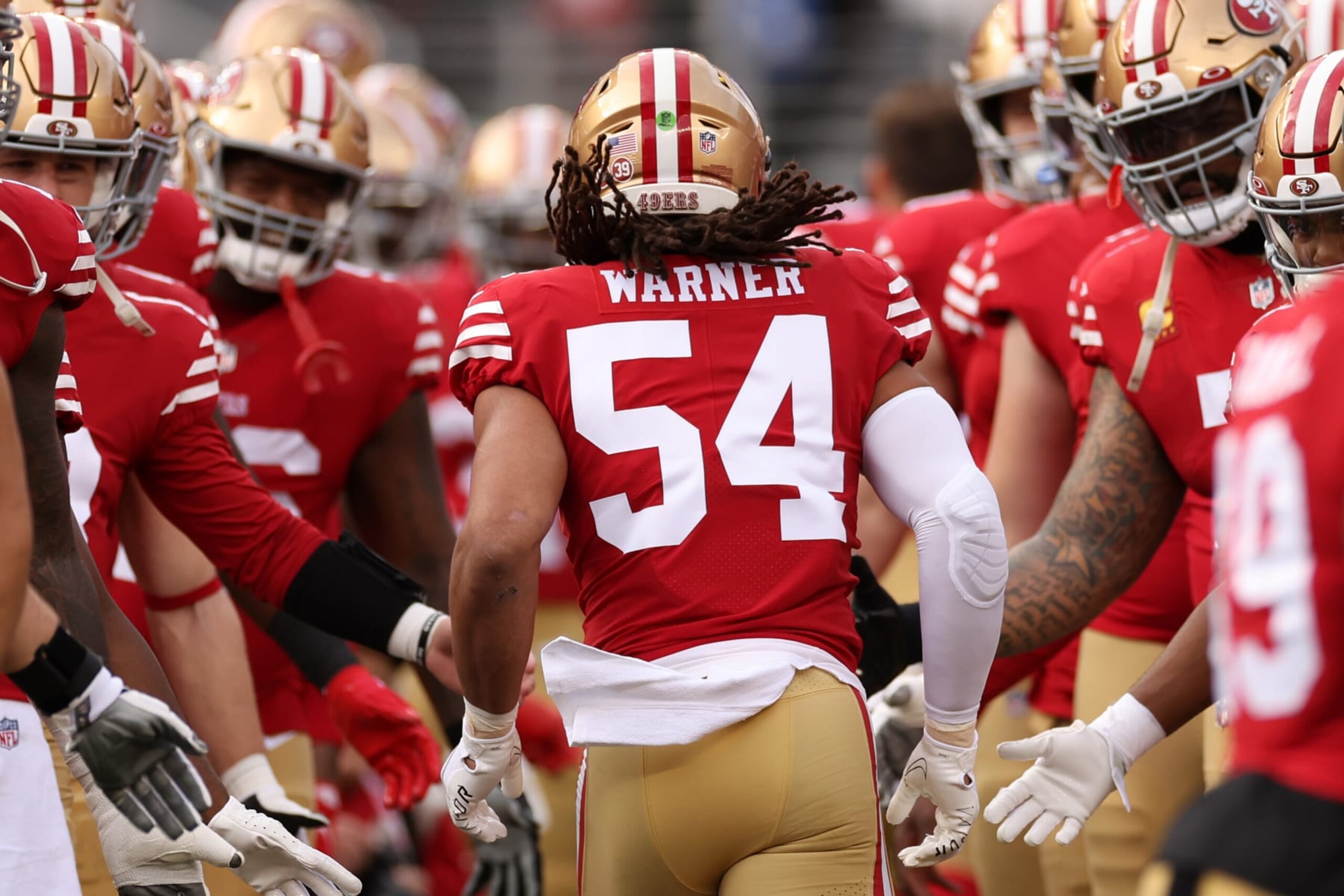 SANTA CLARA, CALIFORNIA - JANUARY 08: Fred Warner #54 of the San Francisco 49ers runs onto the field prior to the game against the Arizona Cardinals at Levi's Stadium on January 08, 2023 in Santa Clara, California. (Photo by Ezra Shaw/Getty Images)