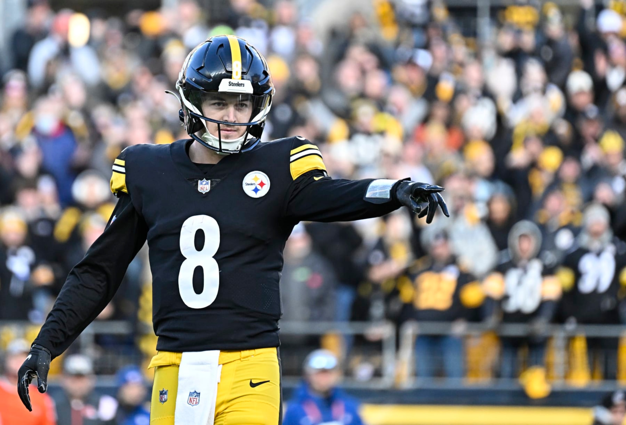 PITTSBURGH, PA - JANUARY 08:   Pittsburgh Steelers quarterback Kenny Pickett (8) points to a flag on the field during the game between the Pittsburgh Steelers and the Cleveland Browns at Acrisure Stadium on January 8, 2023 in Pittsburgh, PA. (Photo by Shelley Lipton/Icon Sportswire via Getty Images)
