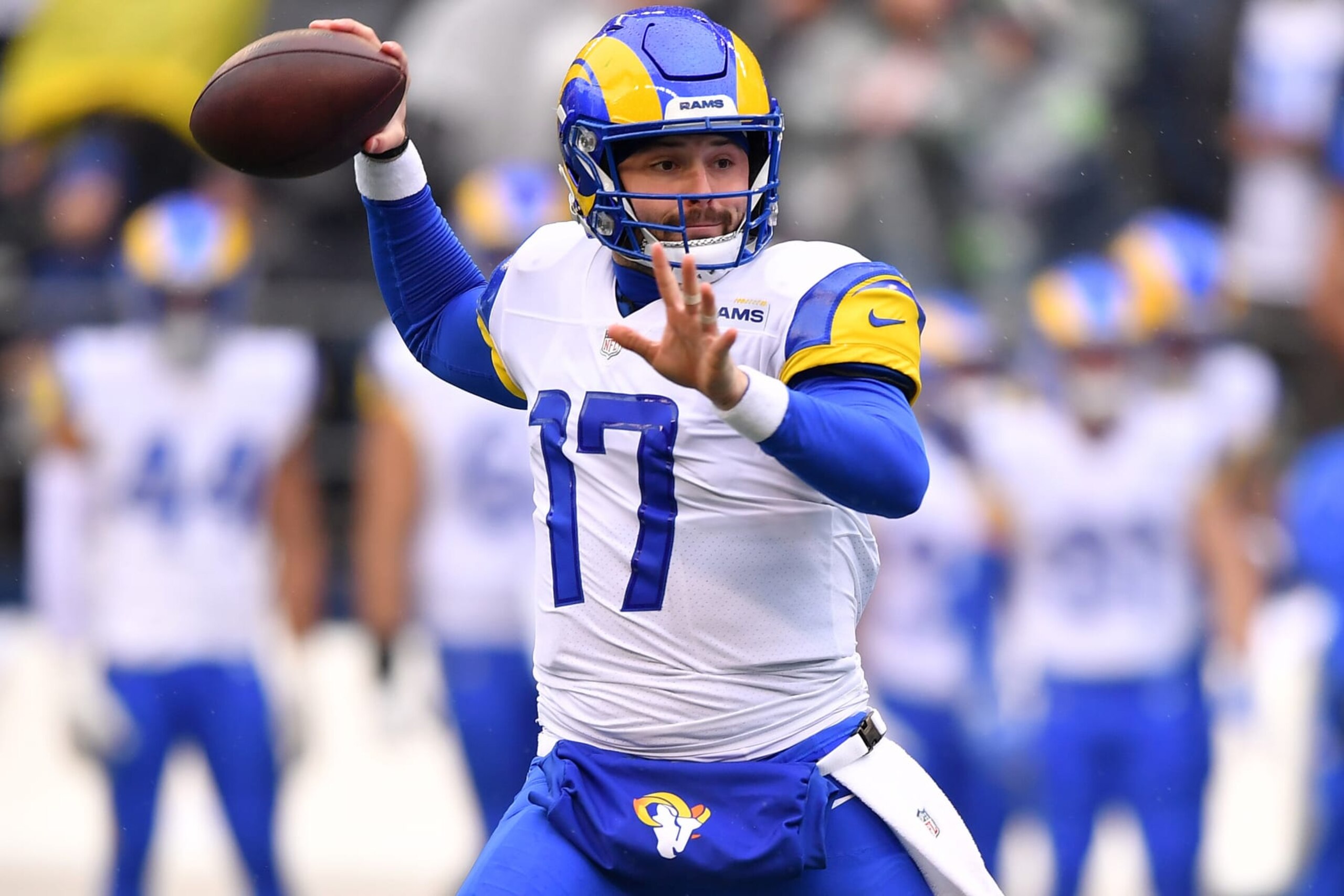 SEATTLE, WASHINGTON - JANUARY 08: Baker Mayfield #17 of the Los Angeles Rams looks to throw the ball during the first quarter against the Seattle Seahawks at Lumen Field on January 08, 2023 in Seattle, Washington. (Photo by Jane Gershovich/Getty Images)