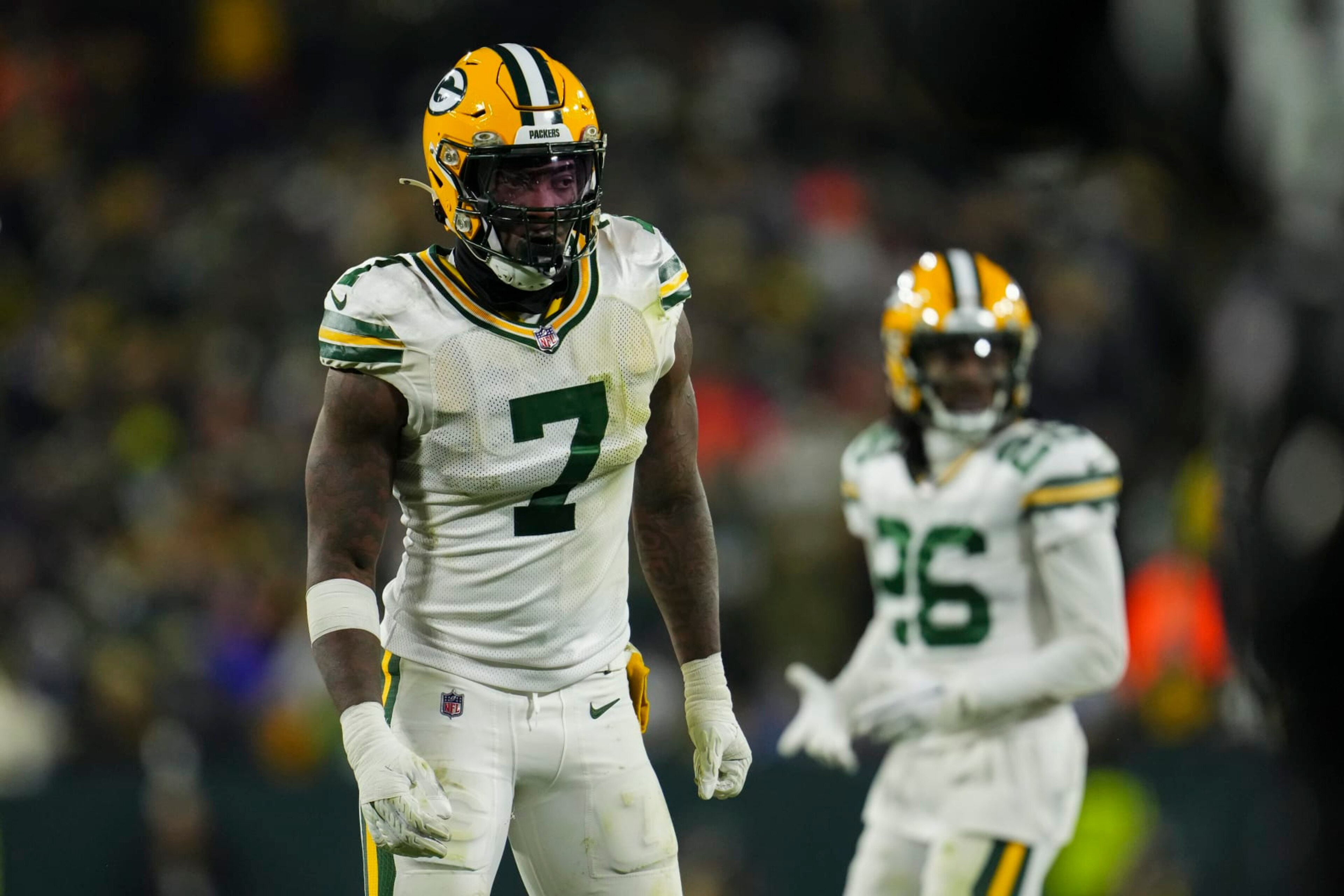 GREEN BAY, WI - NOVEMBER 17: Quay Walker #7 of the Green Bay Packers gets set against the Tennessee Titans at Lambeau on November 17, 2022 in Green Bay, Wisconsin. (Photo by Cooper Neill/Getty Images)