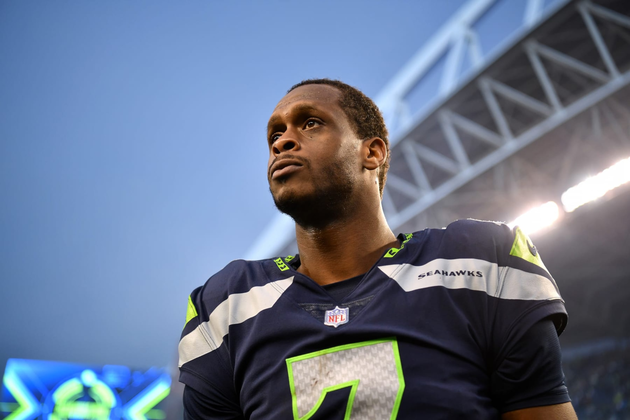 SEATTLE, WASHINGTON - JANUARY 08: Geno Smith #7 of the Seattle Seahawks looks on against the Los Angeles Rams during the fourth quarter at Lumen Field on January 08, 2023 in Seattle, Washington. (Photo by Jane Gershovich/Getty Images)