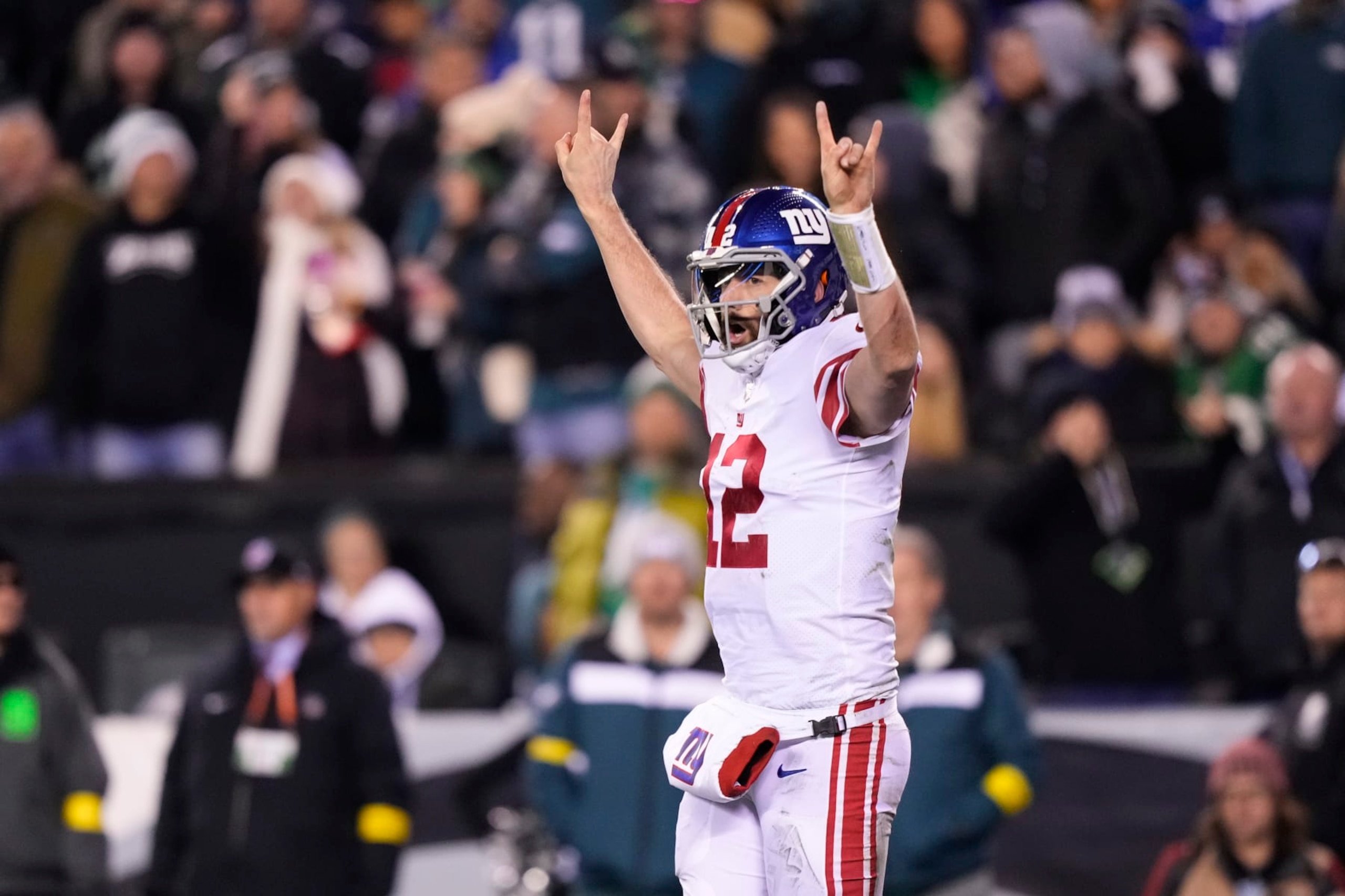 New York Giants quarterback Davis Webb gestures after scoring a touchdown run against the Philadelphia Eagles during the second half of an NFL football game, Sunday, Jan. 8, 2023, in Philadelphia. (AP Photo/Matt Slocum) New York Giants quarterback Davis Webb gestures after scoring a touchdown run against the Philadelphia Eagles during the second half of an NFL football game, Sunday, Jan. 8, 2023, in Philadelphia. (AP Photo/Matt Slocum)