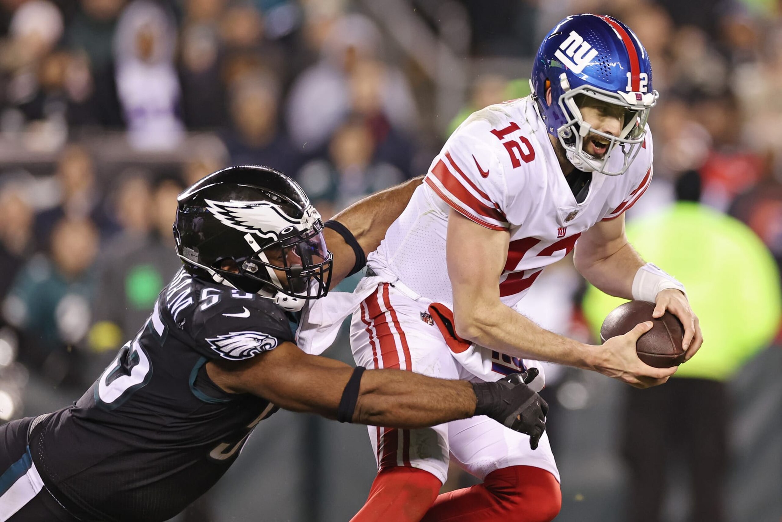PHILADELPHIA, PENNSYLVANIA - JANUARY 08: Brandon Graham #55 of the Philadelphia Eagles pressures Davis Webb #12 of the New York Giants during the third quarter at Lincoln Financial Field on January 08, 2023 in Philadelphia, Pennsylvania. (Photo by Tim Nwachukwu/Getty Images) PHILADELPHIA, PENNSYLVANIA - JANUARY 08: Brandon Graham #55 of the Philadelphia Eagles pressures Davis Webb #12 of the New York Giants during the third quarter at Lincoln Financial Field on January 08, 2023 in Philadelphia, Pennsylvania. (Photo by Tim Nwachukwu/Getty Images)