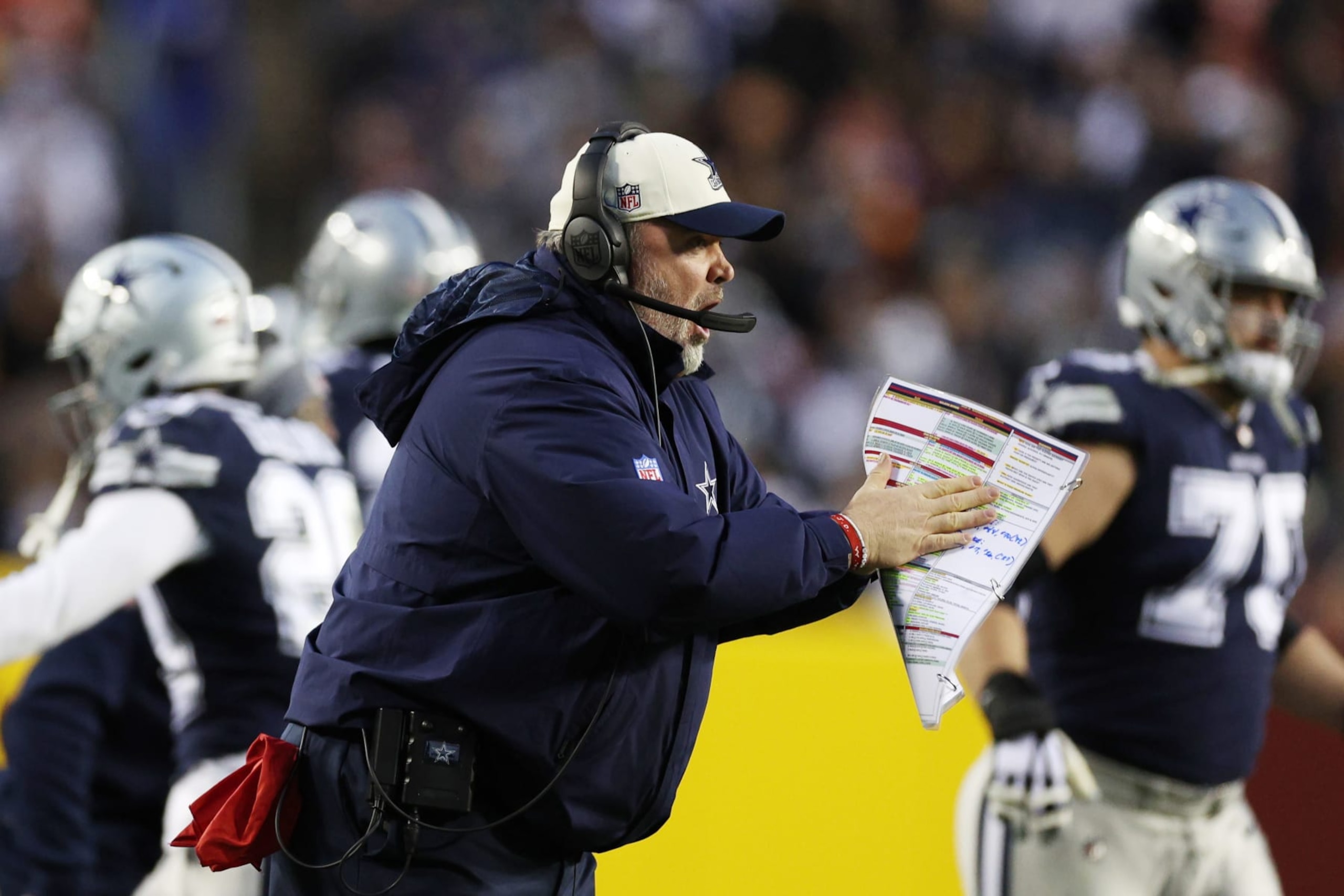 LANDOVER, MARYLAND - JANUARY 08: Head Coach Mike McCarthy of the Dallas Cowboys celebrates after a play during the first half of the game against the Washington Commanders at FedExField on January 08, 2023 in Landover, Maryland. (Photo by Rob Carr/Getty Images)