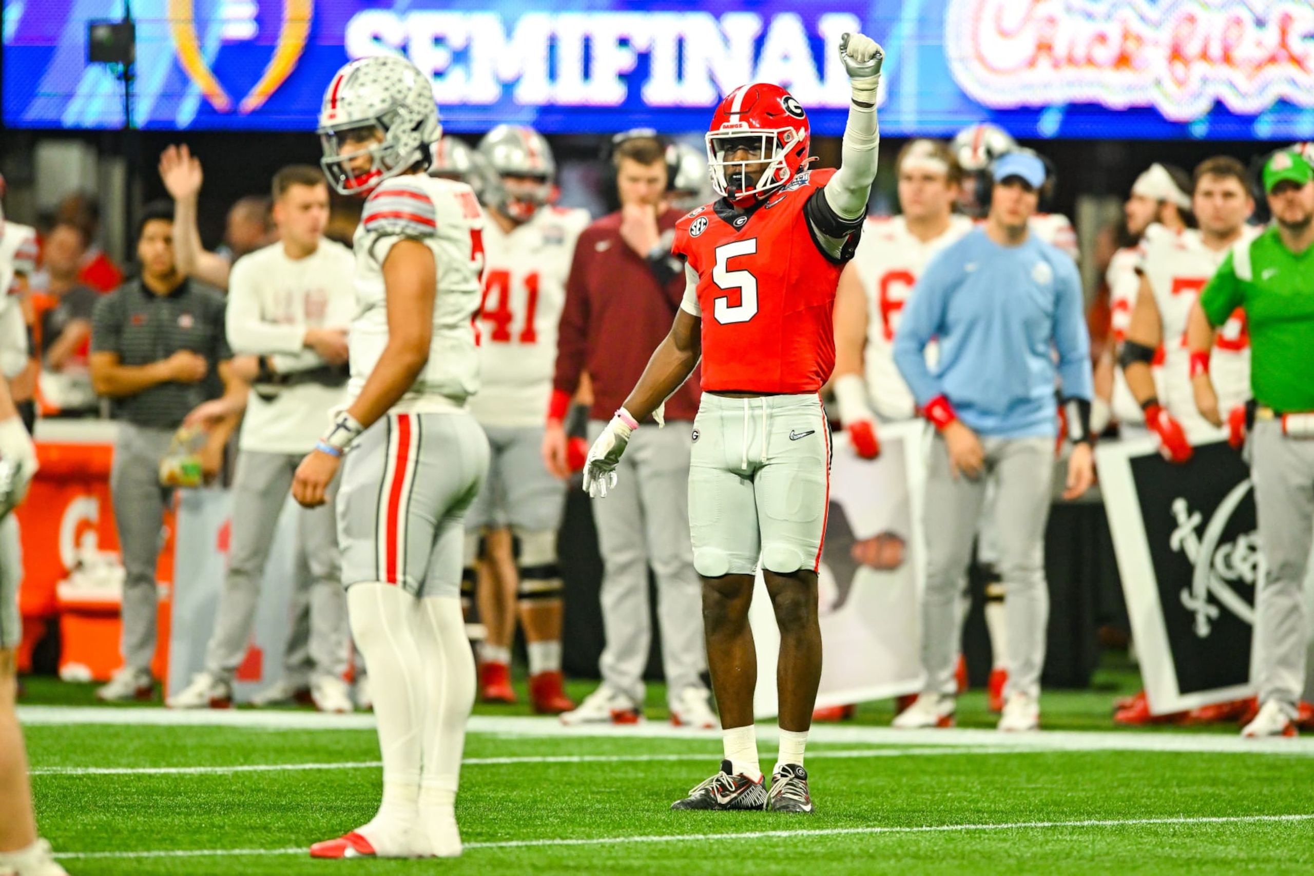 ATLANTA, GA  DECEMBER 31:  Georgia defensive back Kelee Ringo (5) signals for fourth down during the Chick-fil-A Peach Bowl college football playoff game between the Ohio State Buckeyes and the Georgia Bulldogs on December 31st, 2022 at Mercedes-Benz Stadium in Atlanta, GA.  (Photo by Rich von Biberstein/Icon Sportswire via Getty Images)