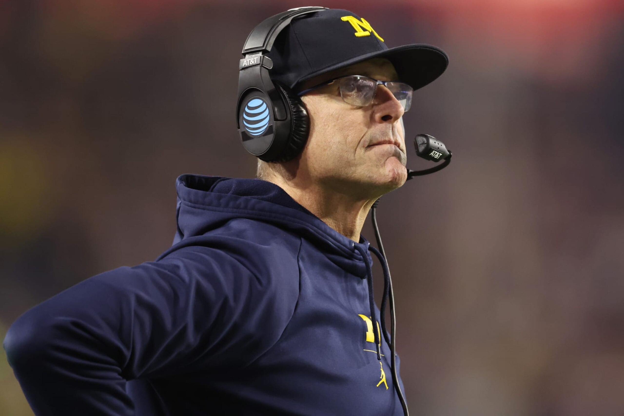 GLENDALE, ARIZONA - DECEMBER 31: Head coach Jim Harbaugh of the Michigan Wolverines is seen on the sideline during the second half against the TCU Horned Frogs in the Vrbo Fiesta Bowl at State Farm Stadium on December 31, 2022 in Glendale, Arizona. (Photo by Christian Petersen/Getty Images) GLENDALE, ARIZONA - DECEMBER 31: Head coach Jim Harbaugh of the Michigan Wolverines is seen on the sideline during the second half against the TCU Horned Frogs in the Vrbo Fiesta Bowl at State Farm Stadium on December 31, 2022 in Glendale, Arizona. (Photo by Christian Petersen/Getty Images)