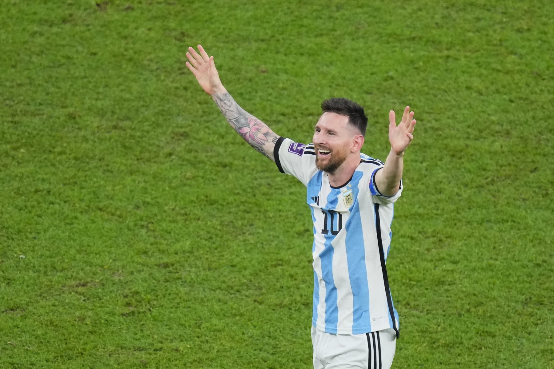 Argentina's Lionel Messi celebrates at the end of the World Cup final soccer match between Argentina and France at the Lusail Stadium in Lusail, Qatar, Sunday, Dec. 18, 2022. Argentina won 4-2 in a penalty shootout after the match ended tied 3-3. (AP Photo/Hassan Ammar)