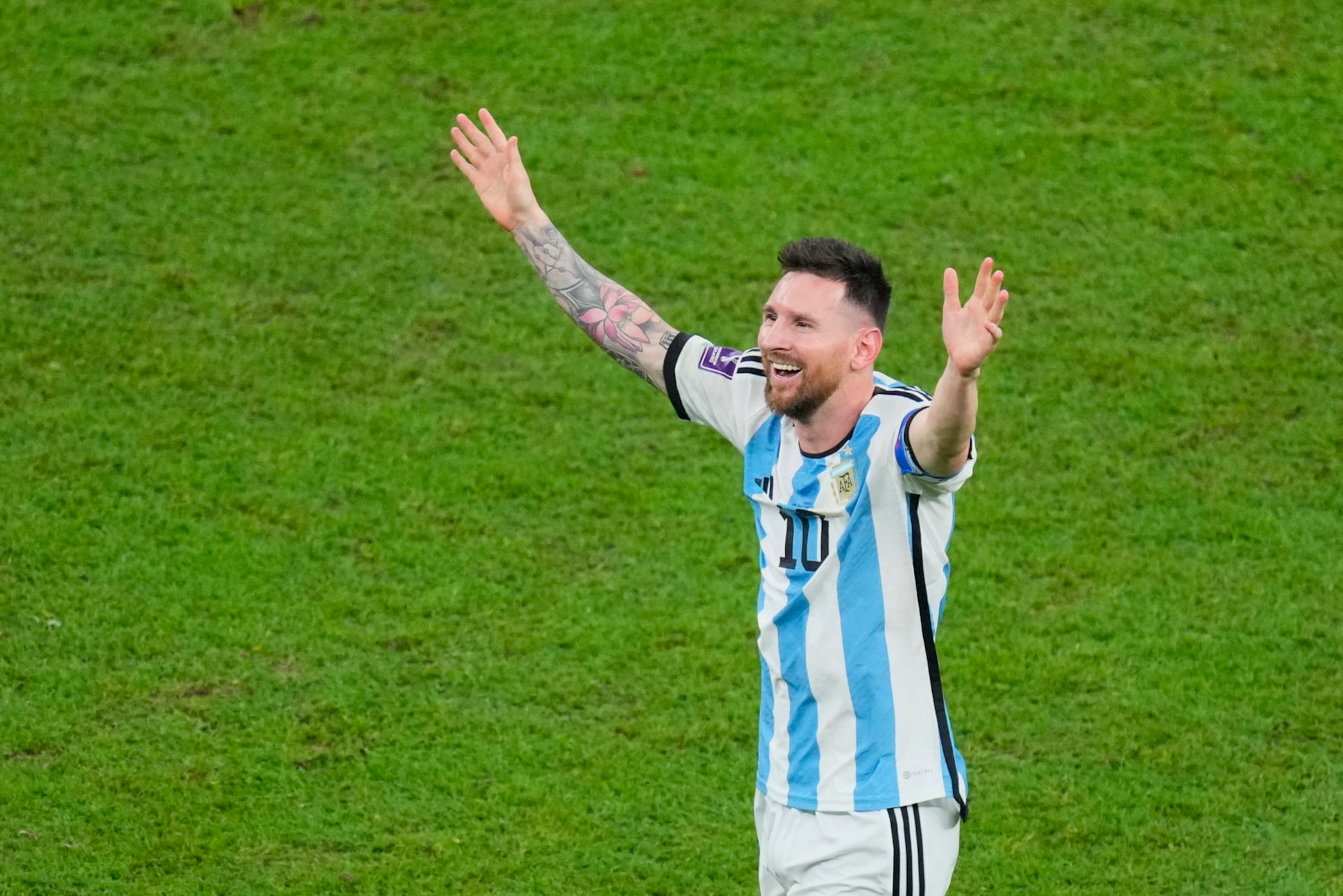 Argentina's Lionel Messi celebrates at the end of the World Cup final soccer match between Argentina and France at the Lusail Stadium in Lusail, Qatar, Sunday, Dec. 18, 2022. Argentina won 4-2 in a penalty shootout after the match ended tied 3-3. (AP Photo/Hassan Ammar)
