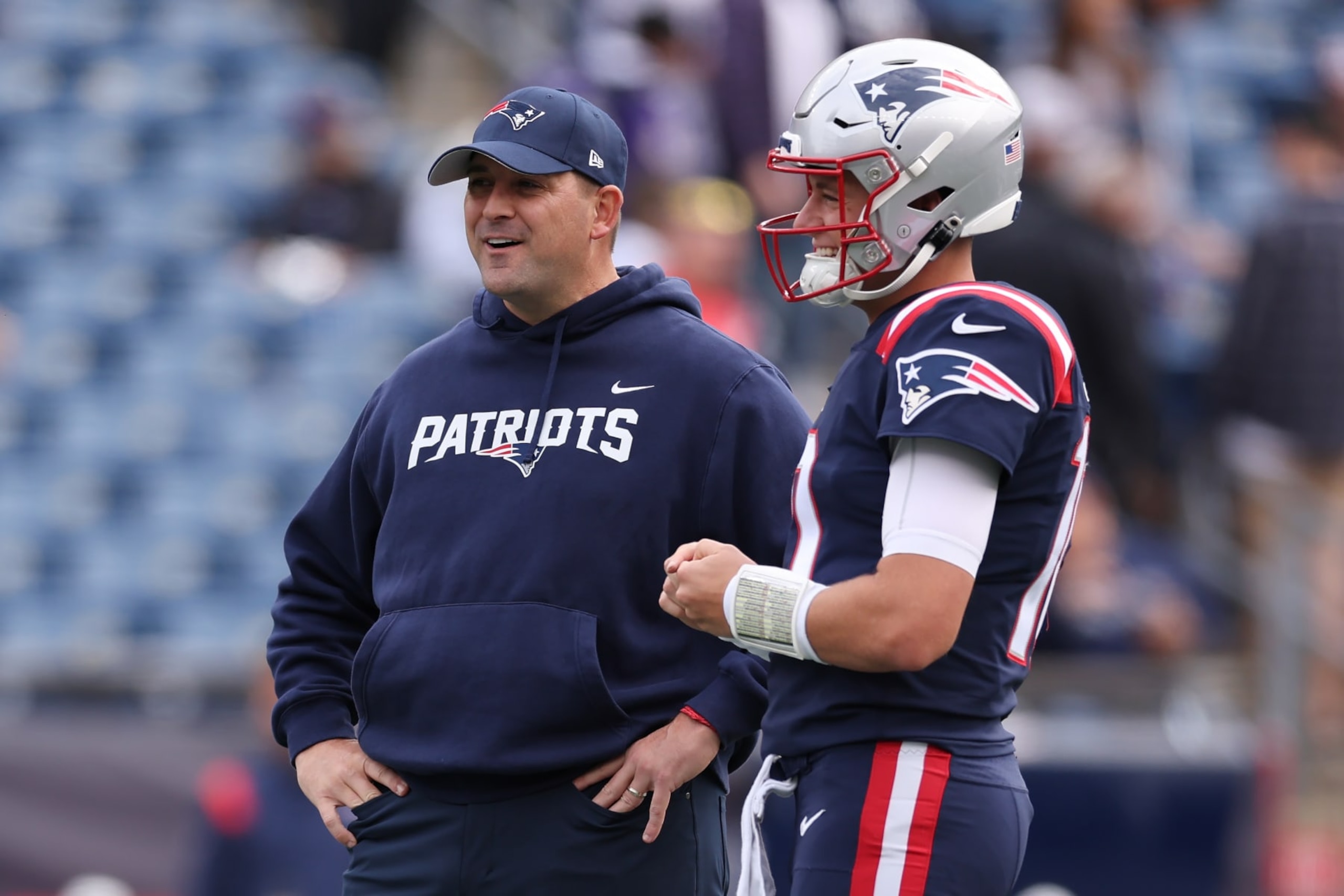 FOXBOROUGH, MASSACHUSETTS - SEPTEMBER 25: Mac Jones #10 of the New England Patriots talks with Quarterbacks coach Joe Judge before the game against the Baltimore Ravens at Gillette Stadium on September 25, 2022 in Foxborough, Massachusetts. (Photo by Maddie Meyer/Getty Images) FOXBOROUGH, MASSACHUSETTS - SEPTEMBER 25: Mac Jones #10 of the New England Patriots talks with Quarterbacks coach Joe Judge before the game against the Baltimore Ravens at Gillette Stadium on September 25, 2022 in Foxborough, Massachusetts. (Photo by Maddie Meyer/Getty Images)
