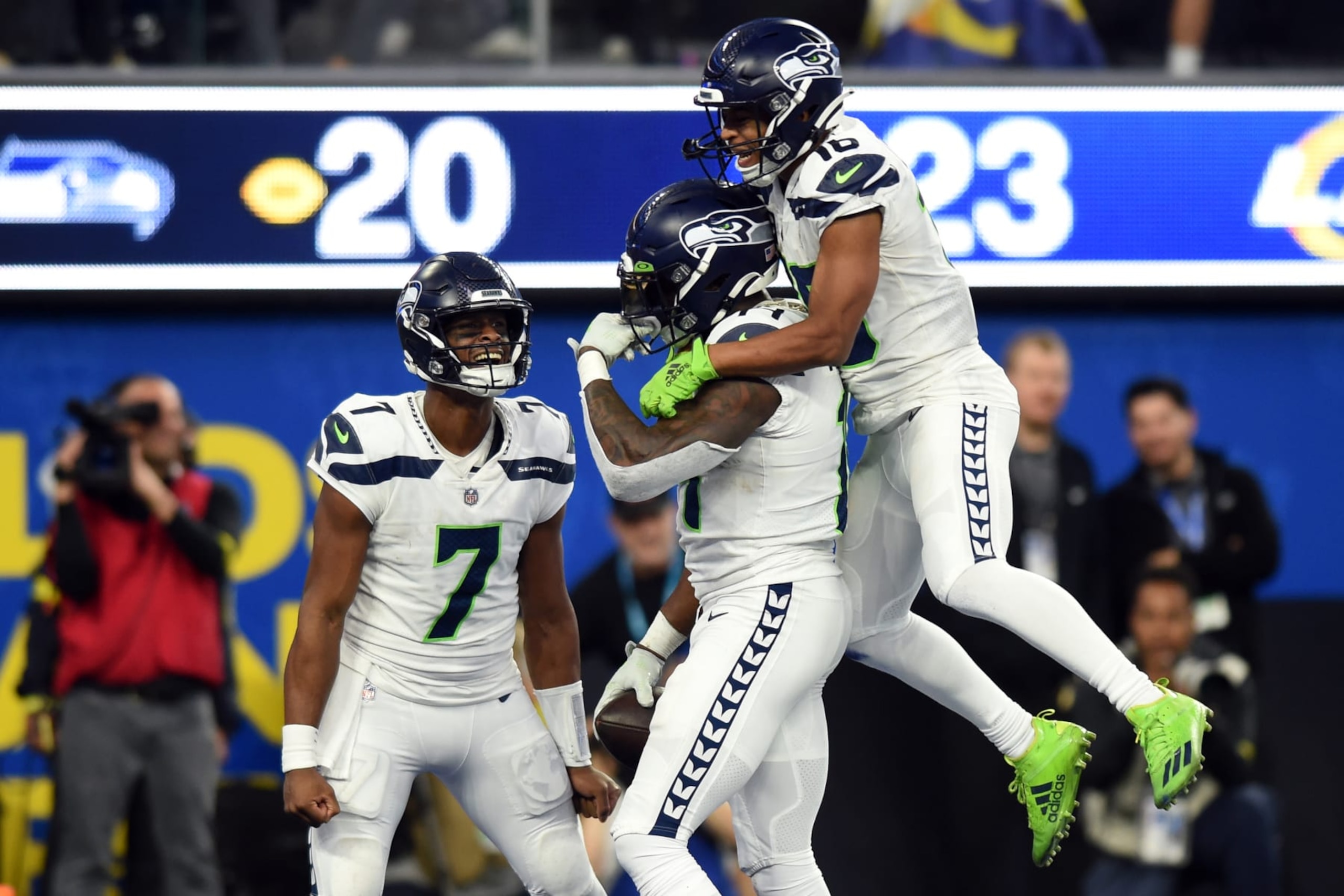 Seattle's Geno Smith (left), DK Metcalf and Tyler Lockett