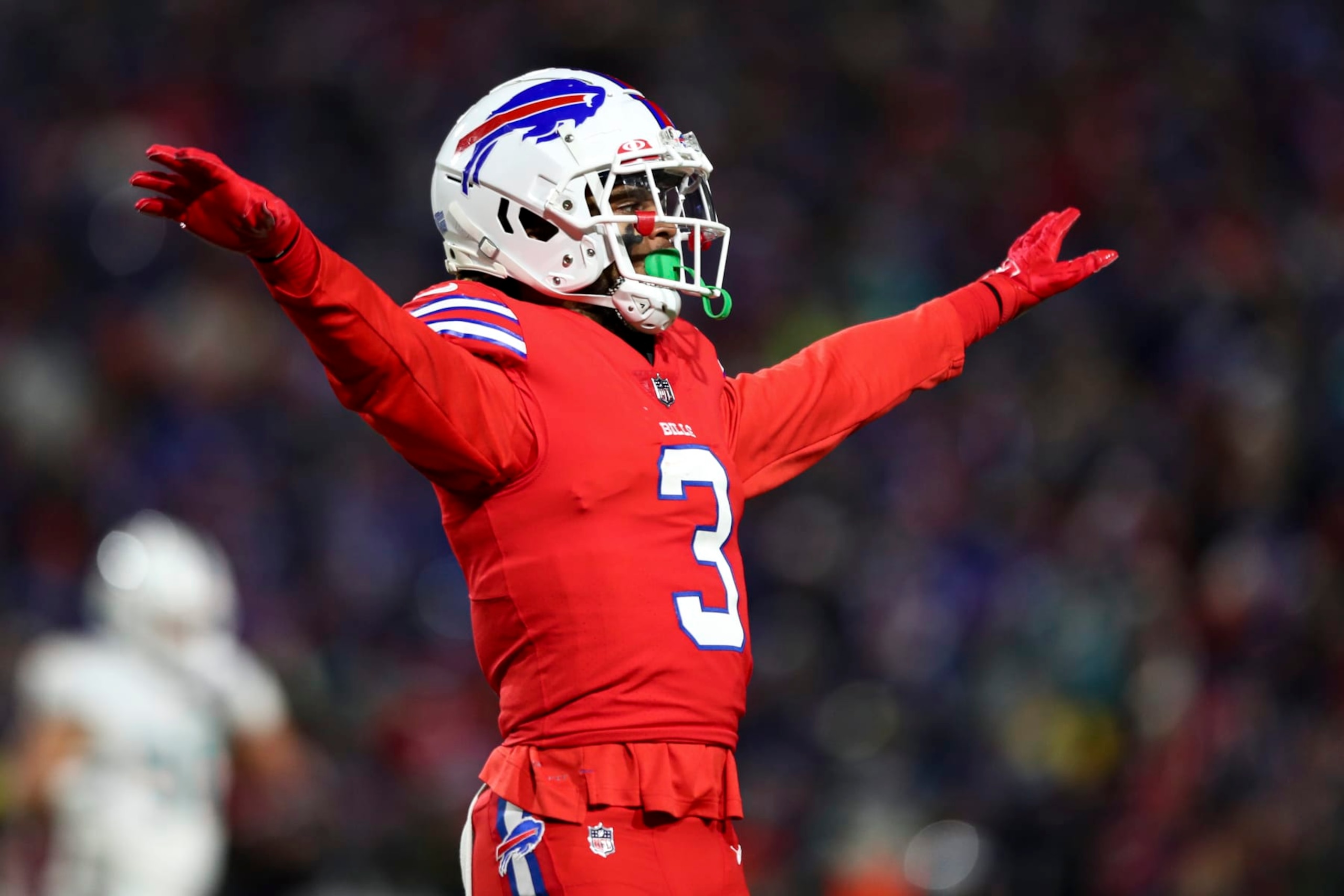 ORCHARD PARK, NY - DECEMBER 17: Damar Hamlin #3 of the Buffalo Bills celebrates after a play during the first quarter of an NFL football game against the Miami Dolphins at Highmark Stadium on December 17, 2022 in Orchard Park, New York. (Photo by Kevin Sabitus/Getty Images) ORCHARD PARK, NY - DECEMBER 17: Damar Hamlin #3 of the Buffalo Bills celebrates after a play during the first quarter of an NFL football game against the Miami Dolphins at Highmark Stadium on December 17, 2022 in Orchard Park, New York. (Photo by Kevin Sabitus/Getty Images)