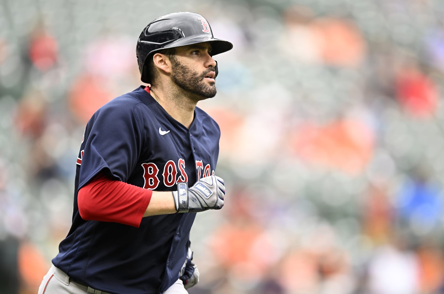 BALTIMORE, MARYLAND - SEPTEMBER 11: J.D. Martinez #28 of the Boston Red Sox runs to first base against the Baltimore Orioles at Oriole Park at Camden Yards on September 11, 2022 in Baltimore, Maryland. (Photo by G Fiume/Getty Images)