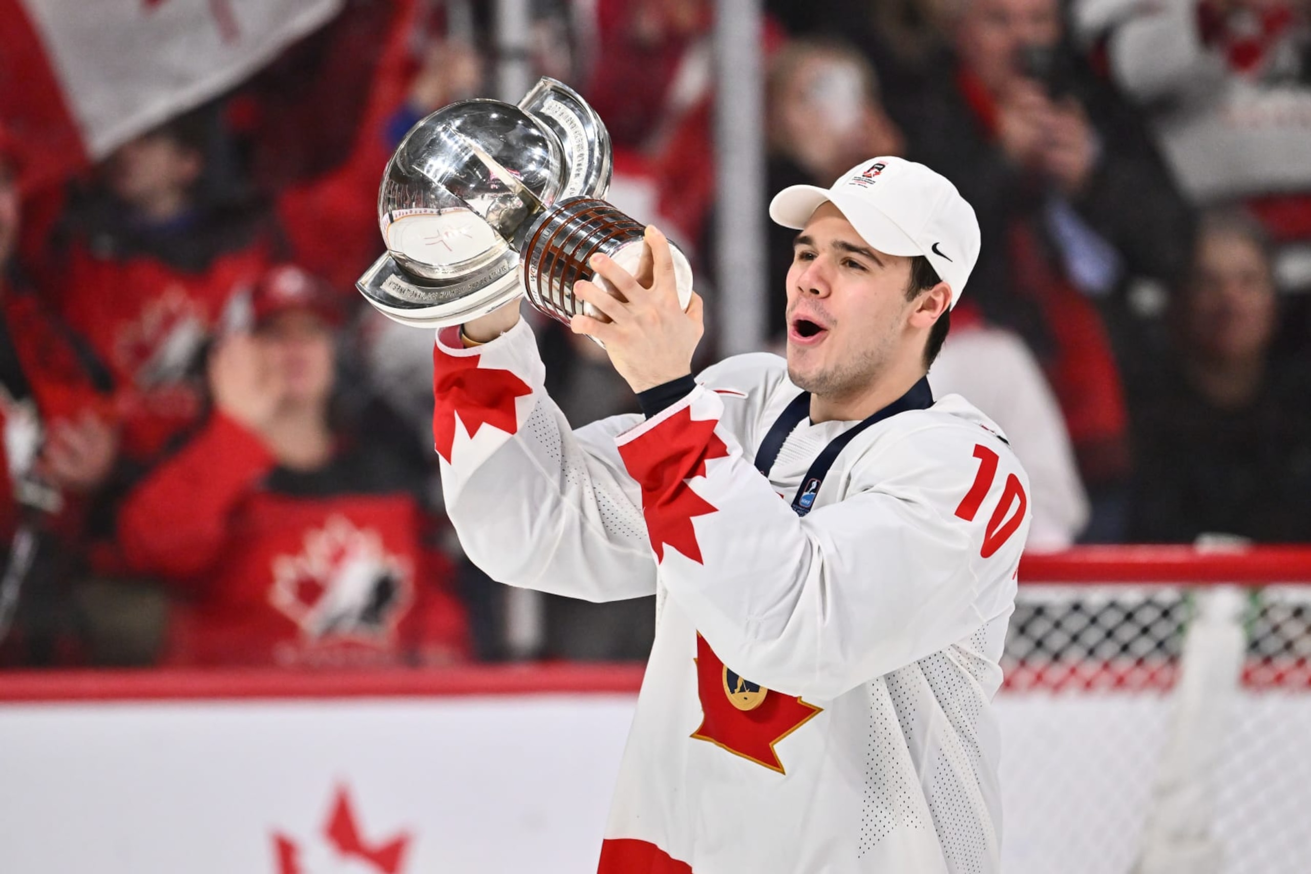 HALIFAX, CANADA - JANUARY 05:  Logan Stankoven #10 of Team Canada skates with the IIHF World Championship Cup after Team Canada defeated Team Czech Republic 3-2 in overtime at the 2023 IIHF World Junior Championship at Scotiabank Centre on January 5, 2023 in Halifax, Nova Scotia, Canada.  (Photo by Minas Panagiotakis/Getty Images)