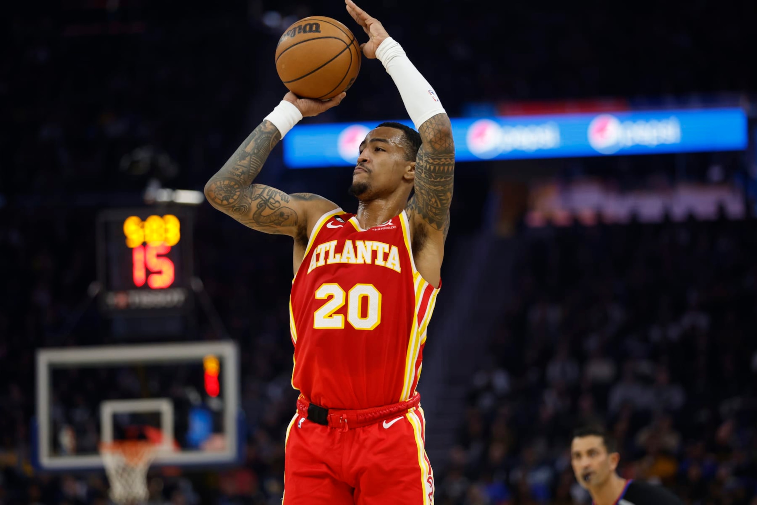 Atlanta Hawks forward John Collins (20) drives shoots against the Golden State Warriors during the first half of an NBA basketball game in San Francisco, Monday, Jan. 2, 2023. (AP Photo/Jed Jacobsohn) Atlanta Hawks forward John Collins (20) drives shoots against the Golden State Warriors during the first half of an NBA basketball game in San Francisco, Monday, Jan. 2, 2023. (AP Photo/Jed Jacobsohn)