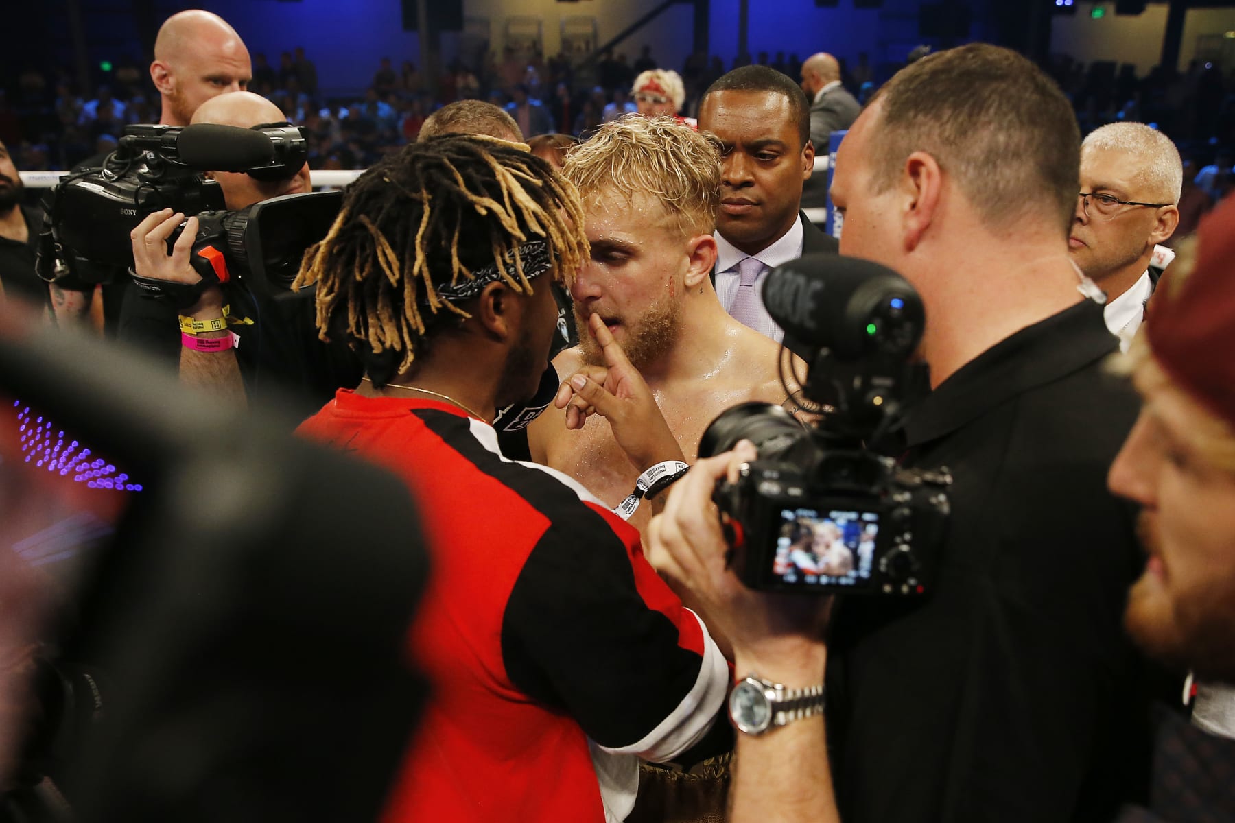 MIAMI, FLORIDA - JANUARY 30:  Jake Paul and KSI argue after Paul defeated AnEsonGib in a first round knockout during their fight at Meridian at Island Gardens on January 30, 2020 in Miami, Florida. (Photo by Michael Reaves/Getty Images)