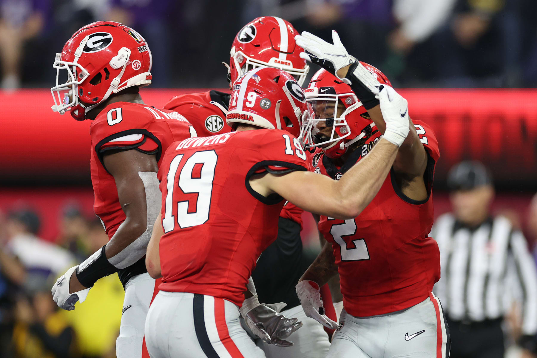 INGLEWOOD, CALIFORNIA - JANUARY 09: Kendall Milton #2 of the Georgia Bulldogs reacts with teammates after running for a touchdown in the second quarter against the TCU Horned Frogs in the College Football Playoff National Championship game at SoFi Stadium on January 09, 2023 in Inglewood, California. (Photo by Ezra Shaw/Getty Images)
