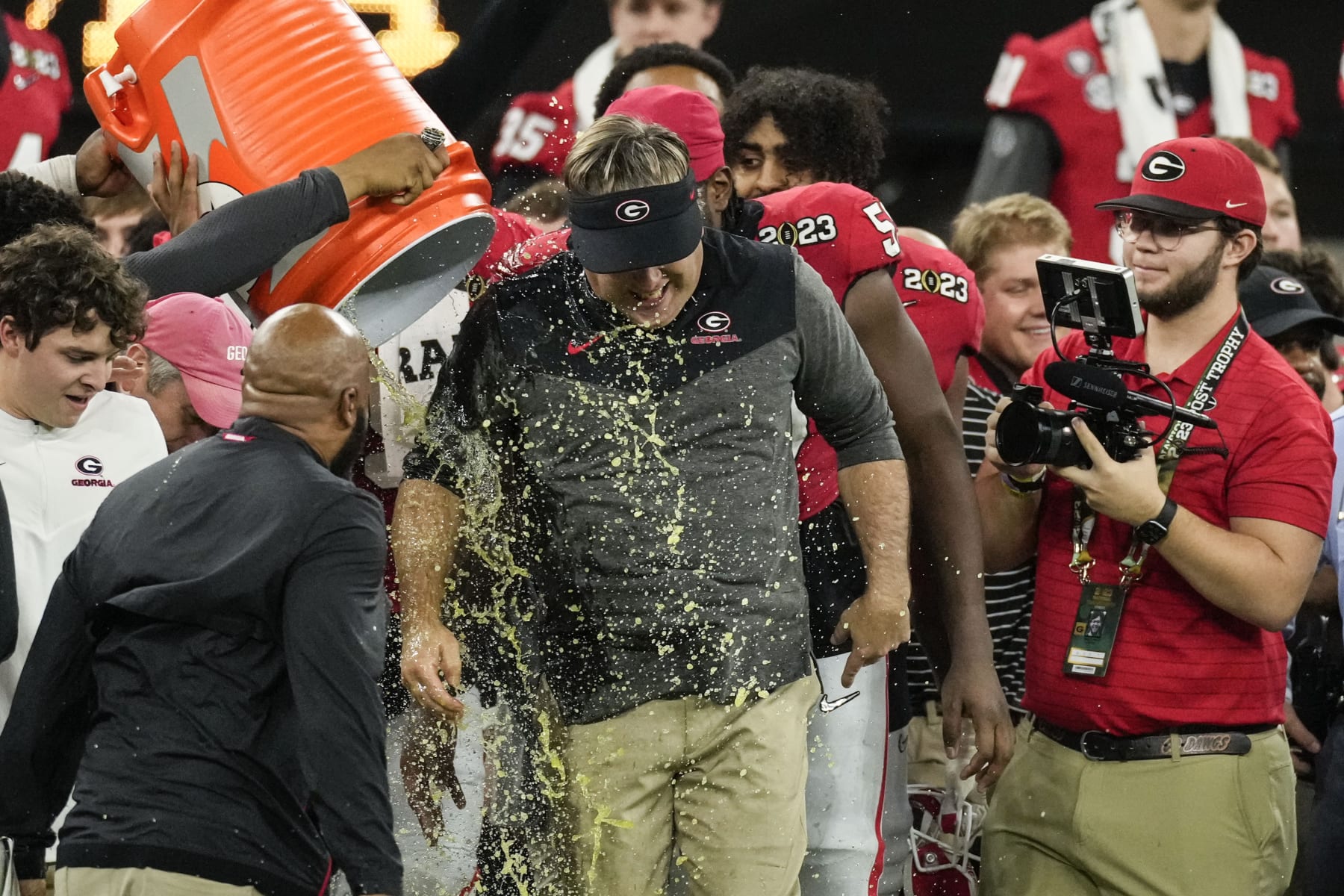 Georgia head coach Kirby Smart is doused during the second half of the national championship NCAA College Football Playoff game against TCU, Monday, Jan. 9, 2023, in Inglewood, Calif. Georgia won 65-7. (AP Photo/Marcio Jose Sanchez)