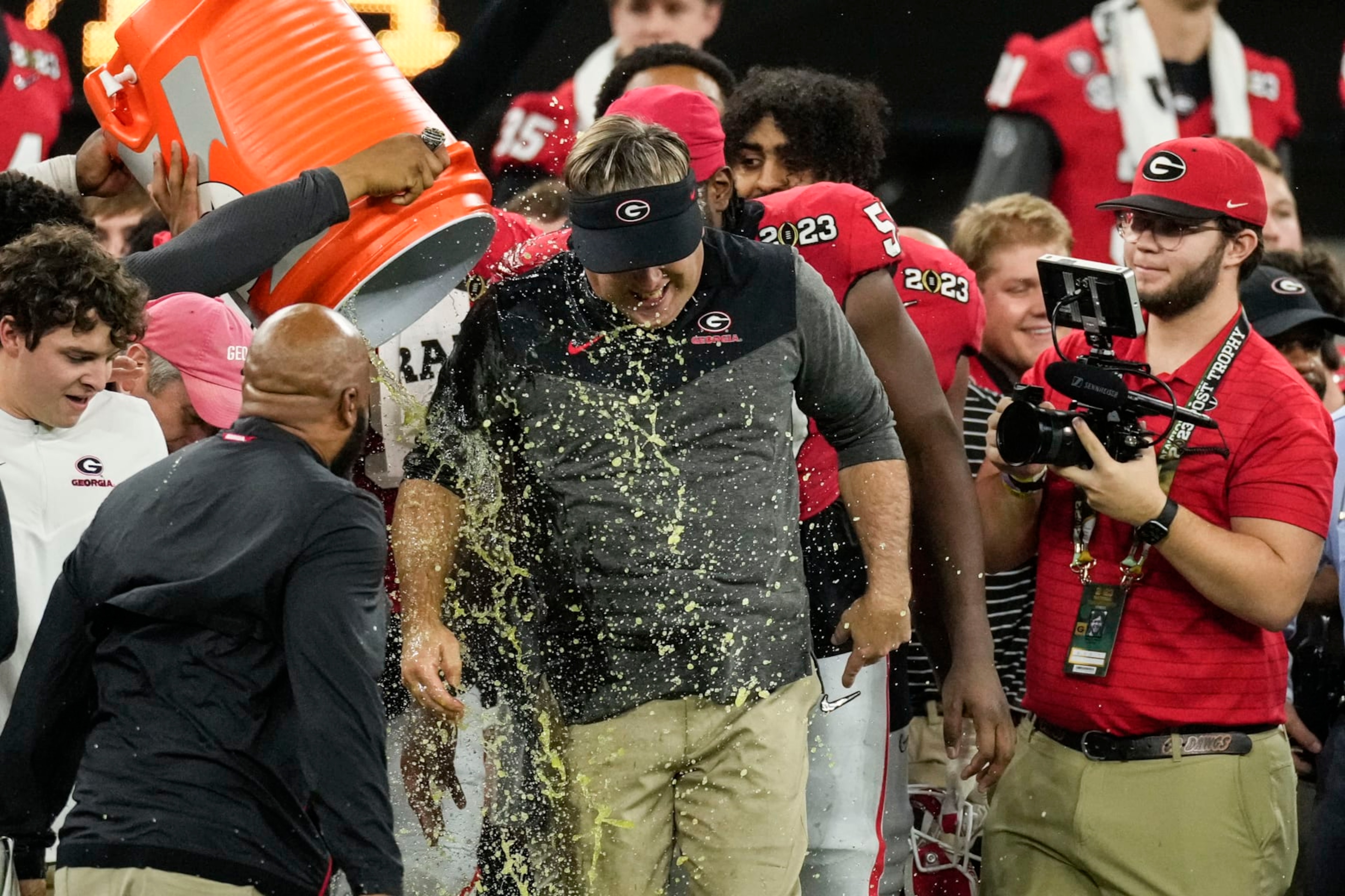 Georgia head coach Kirby Smart is doused during the second half of the national championship NCAA College Football Playoff game against TCU, Monday, Jan. 9, 2023, in Inglewood, Calif. Georgia won 65-7. (AP Photo/Marcio Jose Sanchez)