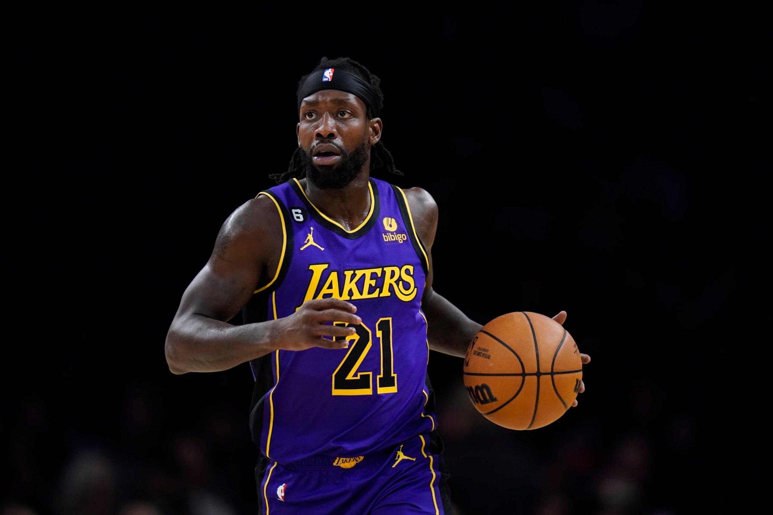 Los Angeles Lakers' Patrick Beverley (21) dribbles during the first half of an NBA basketball game against the Atlanta Hawks Sunday, Jan. 8, 2023, in Los Angeles. (AP Photo/Jae C. Hong)