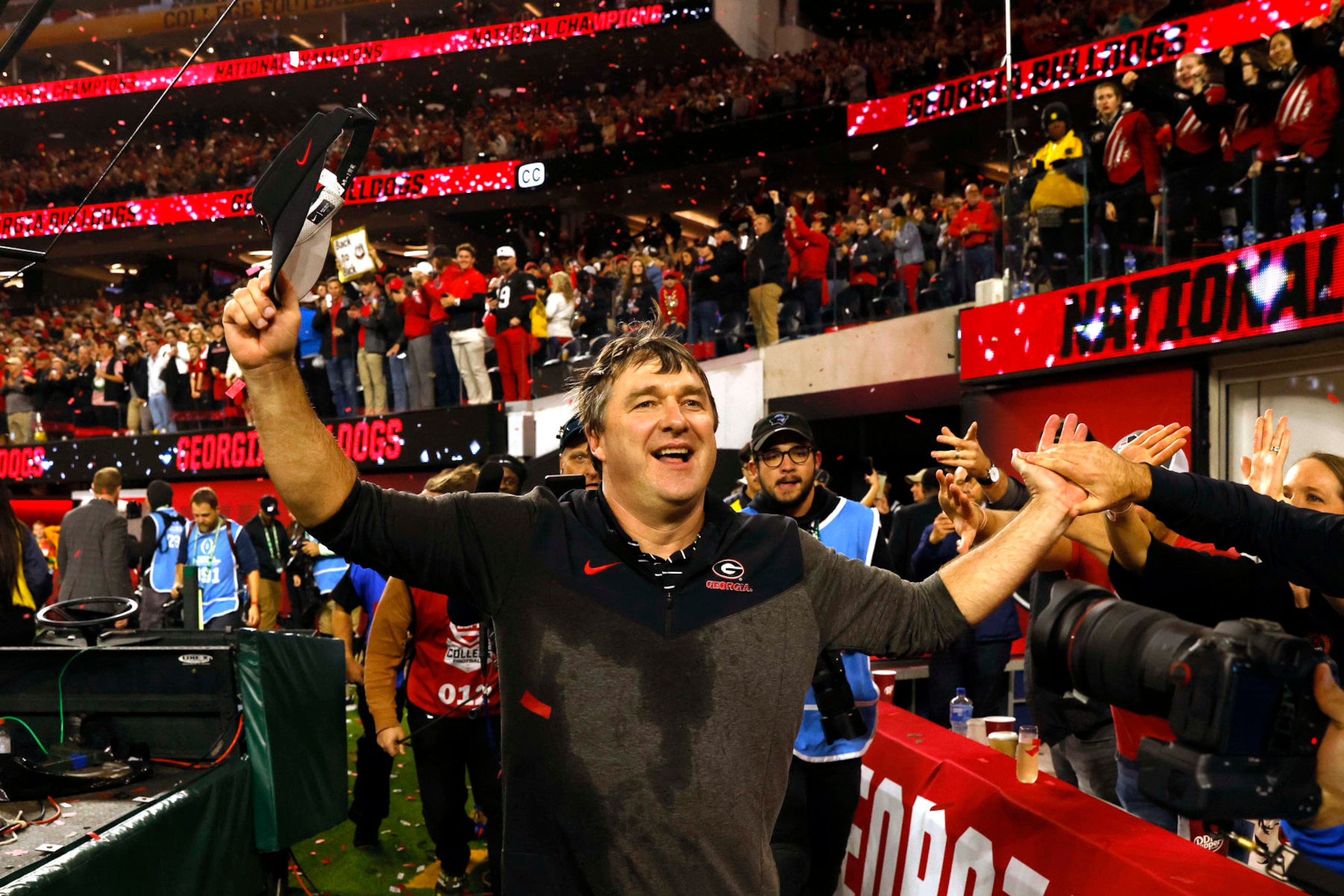 INGLEWOOD, CALIFORNIA - JANUARY 09: Head coach Kirby Smart of the Georgia Bulldogs celebrates with fans after beating the TCU Horned Frogs in the College Football Playoff National Championship game at SoFi Stadium on January 09, 2023 in Inglewood, California. (Photo by Sean M. Haffey/Getty Images)