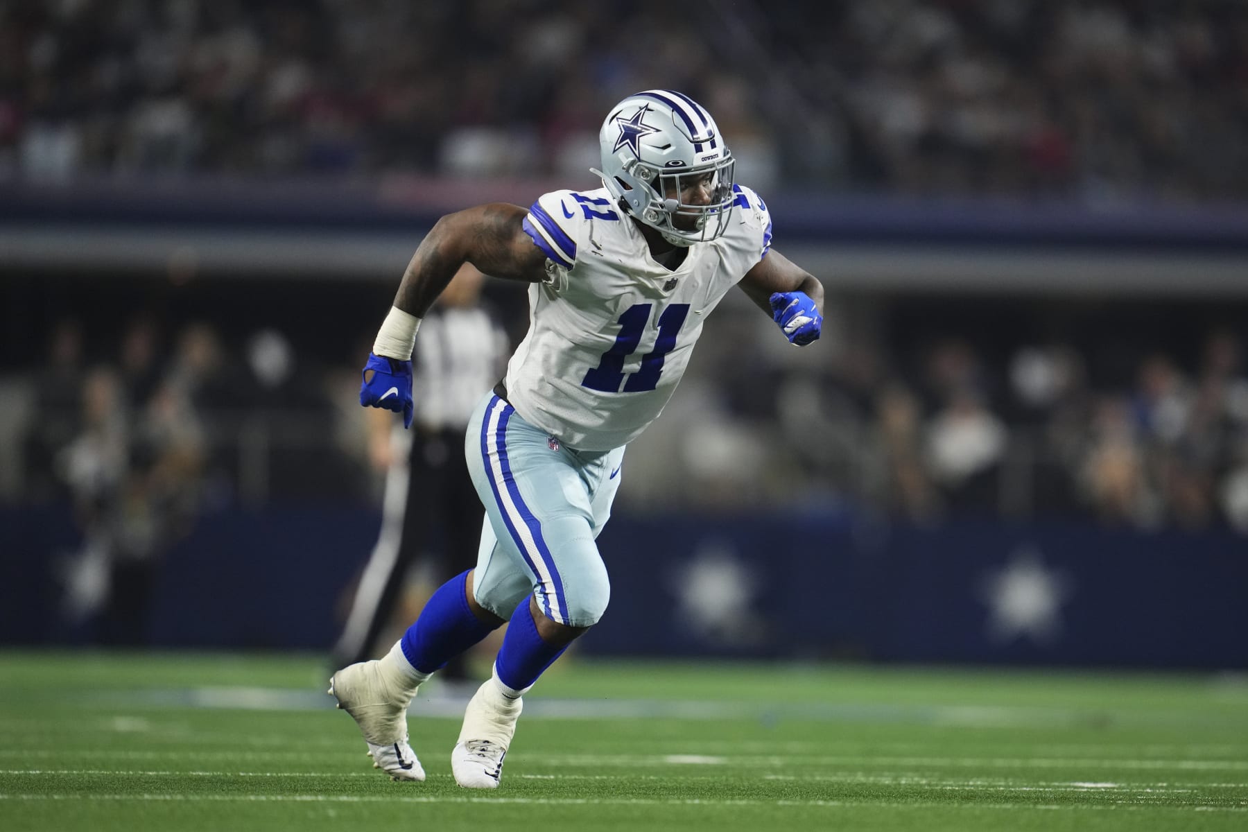 ARLINGTON, TX - SEPTEMBER 11: Micah Parsons #11 of the Dallas Cowboys defends against the Tampa Bay Buccaneers at AT&T Stadium on September 11, 2022 in Arlington, TX. (Photo by Cooper Neill/Getty Images)