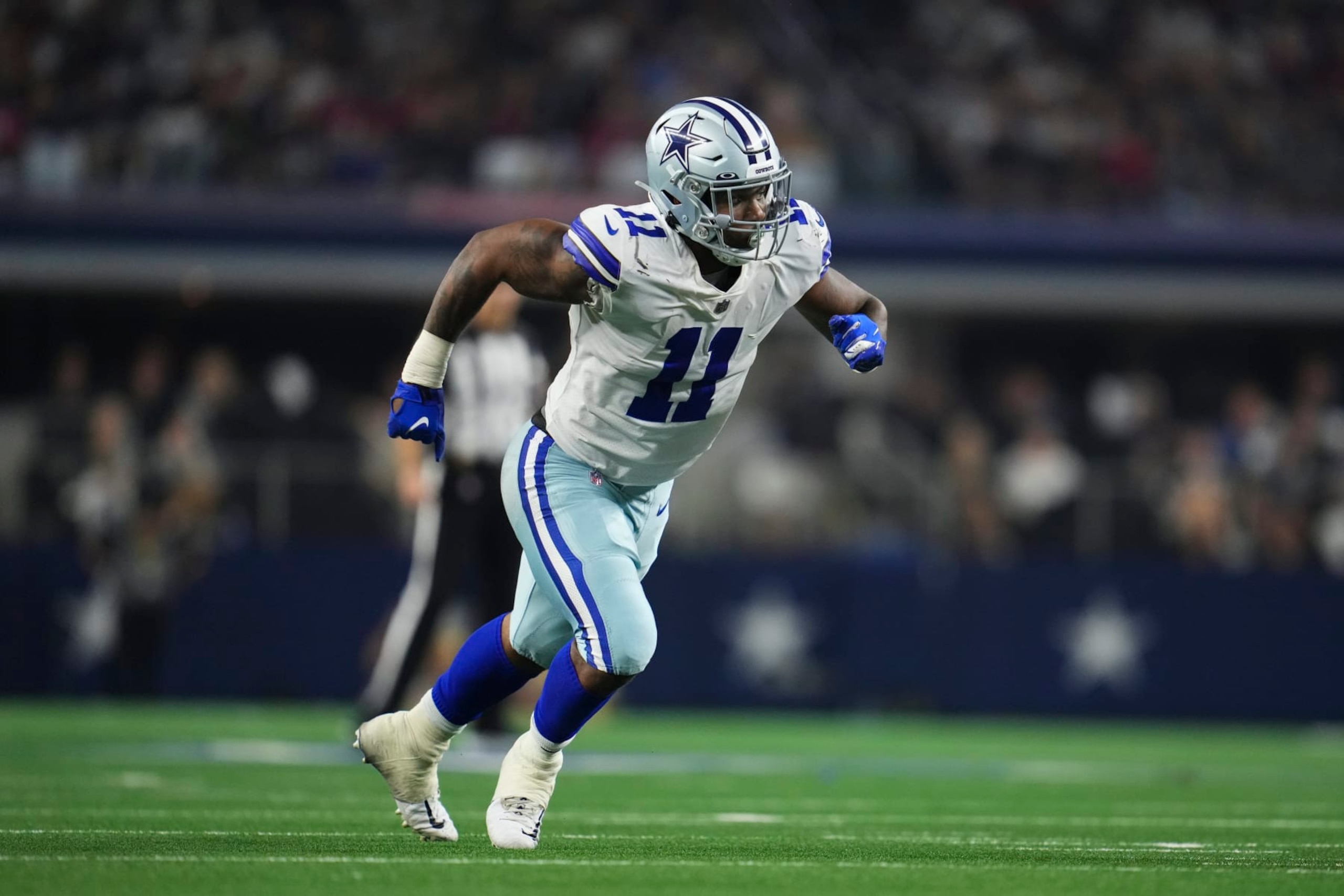 ARLINGTON, TX - SEPTEMBER 11: Micah Parsons #11 of the Dallas Cowboys defends against the Tampa Bay Buccaneers at AT&T Stadium on September 11, 2022 in Arlington, TX. (Photo by Cooper Neill/Getty Images)