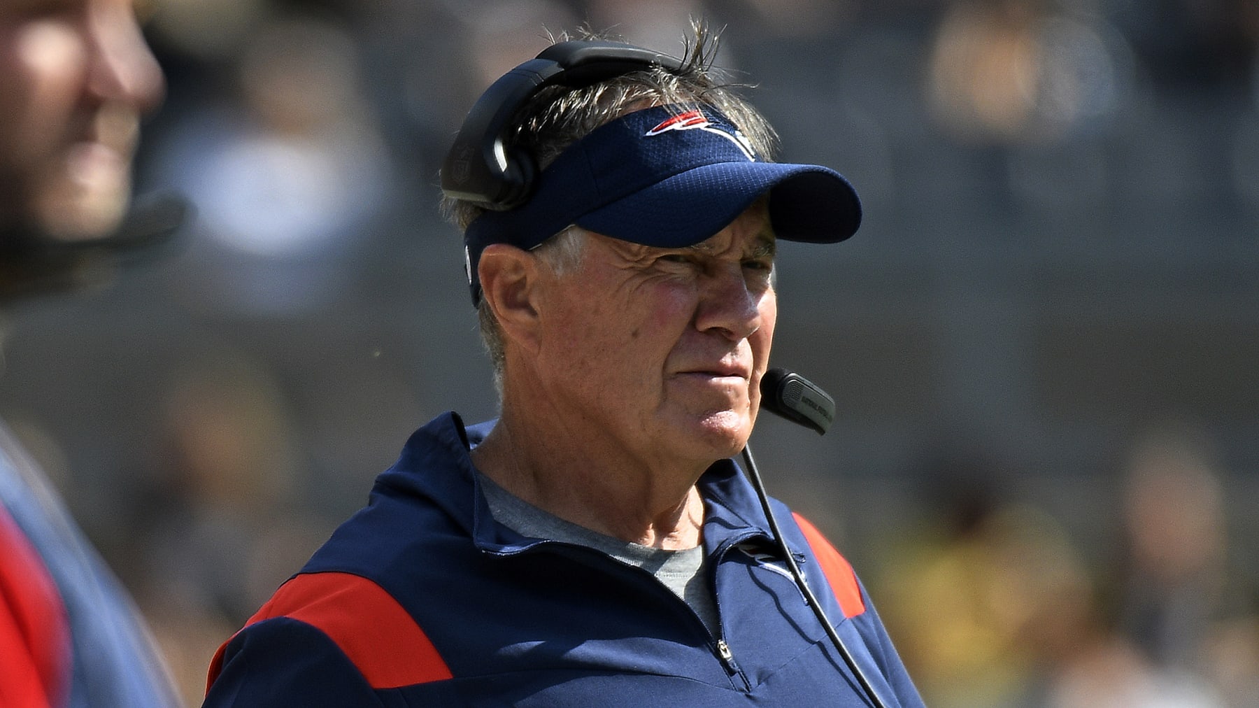 New England Patriots head coach Bill Belichick stands on the sidelines during the second half of an NFL football game against the Pittsburgh Steelers in Pittsburgh, Sunday, Sept. 18, 2022. (AP Photo/Don Wright)
