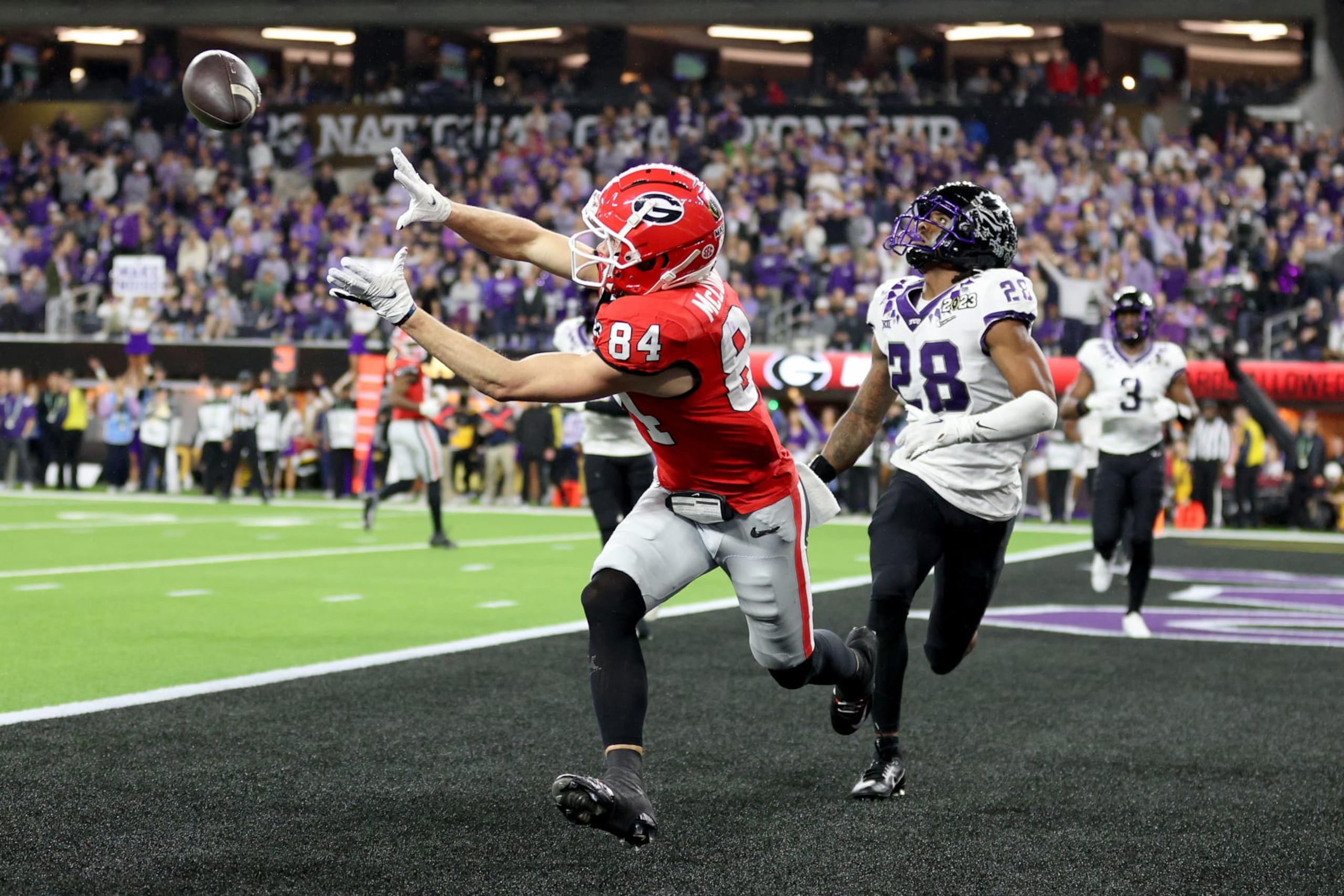 INGLEWOOD, CALIFORNIA - JANUARY 09: Ladd McConkey #84 of the Georgia Bulldogs catches a 14 yard touchdown in the third quarter against the TCU Horned Frogs in the College Football Playoff National Championship game at SoFi Stadium on January 09, 2023 in Inglewood, California. (Photo by Ezra Shaw/Getty Images) INGLEWOOD, CALIFORNIA - JANUARY 09: Ladd McConkey #84 of the Georgia Bulldogs catches a 14 yard touchdown in the third quarter against the TCU Horned Frogs in the College Football Playoff National Championship game at SoFi Stadium on January 09, 2023 in Inglewood, California. (Photo by Ezra Shaw/Getty Images)