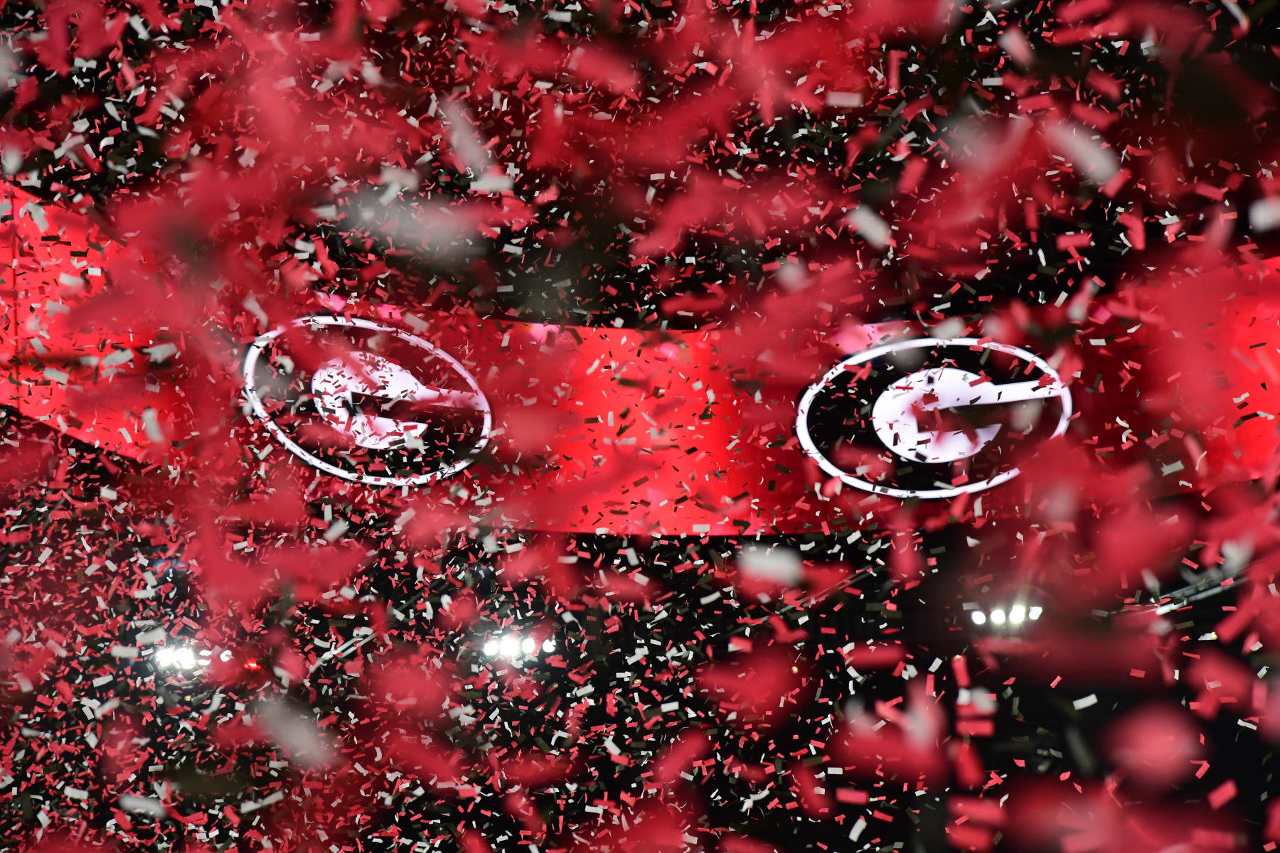 INGLEWOOD, CA - JANUARY 09: Red and black confetti fills the air the the Georgia Bulldogs logo is displayed on the scoreboard after the Georgia Bulldogs 65-7 victory over the TCU Horned Frogs in the College Football Playoff National Championship game on January 9, 2023, at SoFi Stadium in Inglewood, CA. (Photo by John Cordes/Icon Sportswire via Getty Images)