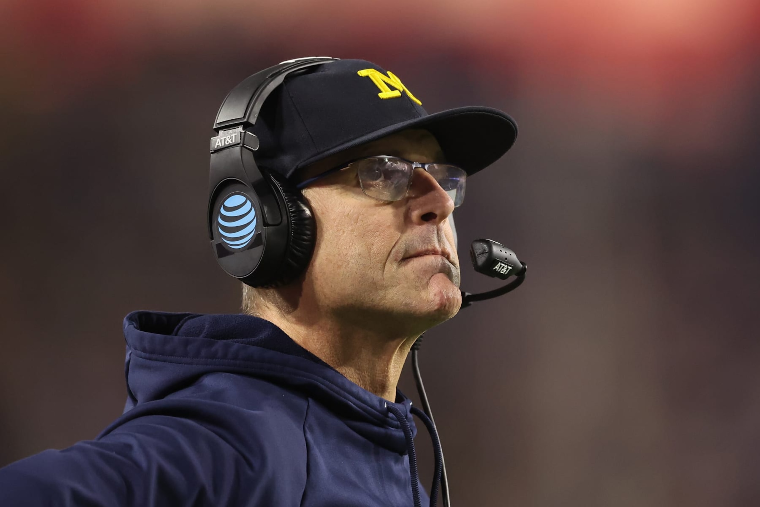 GLENDALE, ARIZONA - DECEMBER 31:  Head coach Jim Harbaugh of the Michigan Wolverines looks on during the Vrbo Fiesta Bowl at State Farm Stadium on December 31, 2022 in Glendale, Arizona. The Horned Frogs defeated the Wolverines 51-45.  (Photo by Christian Petersen/Getty Images)