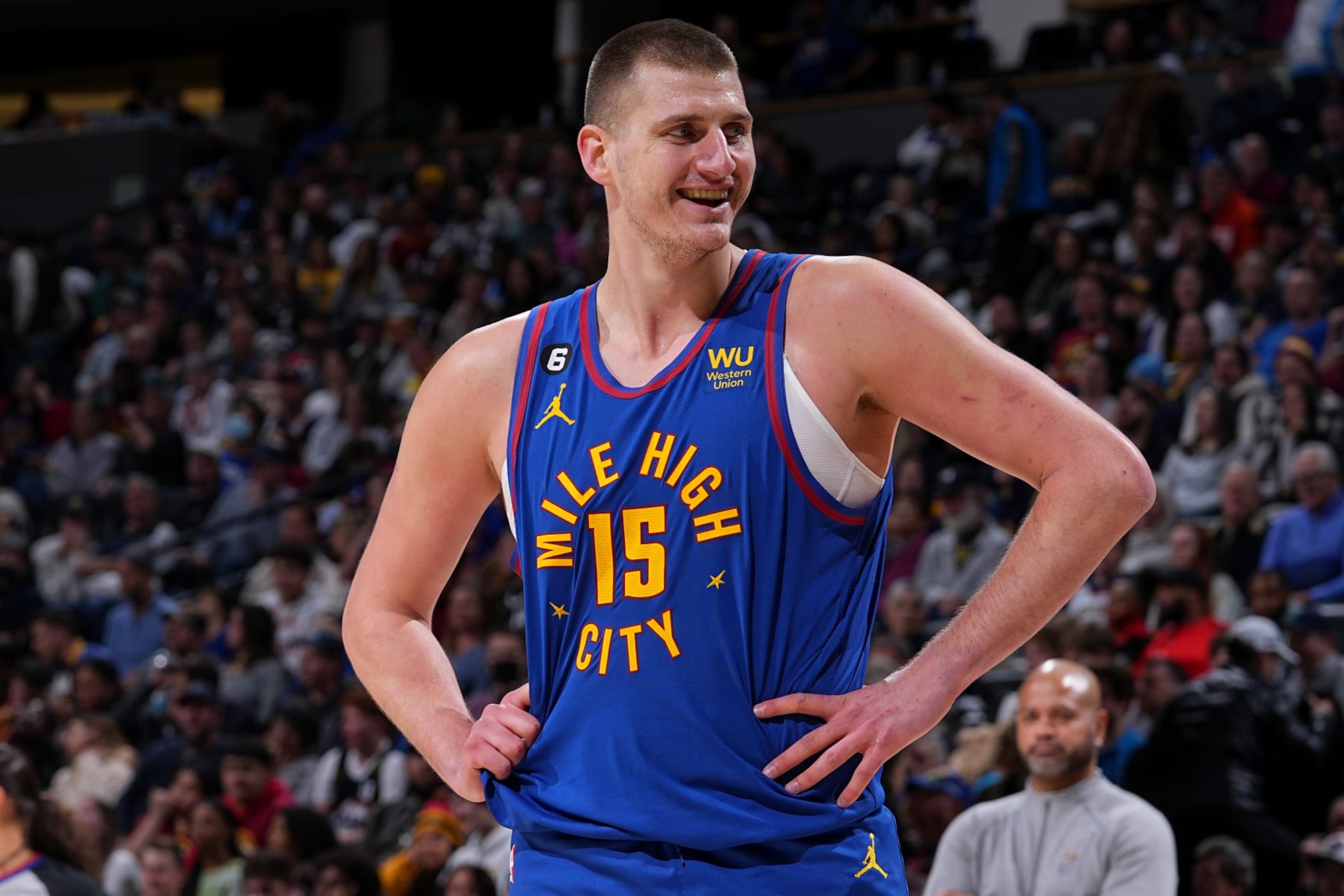 DENVER, CO - JANUARY 6: Nikola Jokic #15 of the Denver Nuggets looks on during the game against the Cleveland Cavaliers on January 6, 2023 at the Ball Arena in Denver, Colorado. NOTE TO USER: User expressly acknowledges and agrees that, by downloading and/or using this Photograph, user is consenting to the terms and conditions of the Getty Images License Agreement. Mandatory Copyright Notice: Copyright 2023 NBAE (Photo by Bart Young/NBAE via Getty Images)