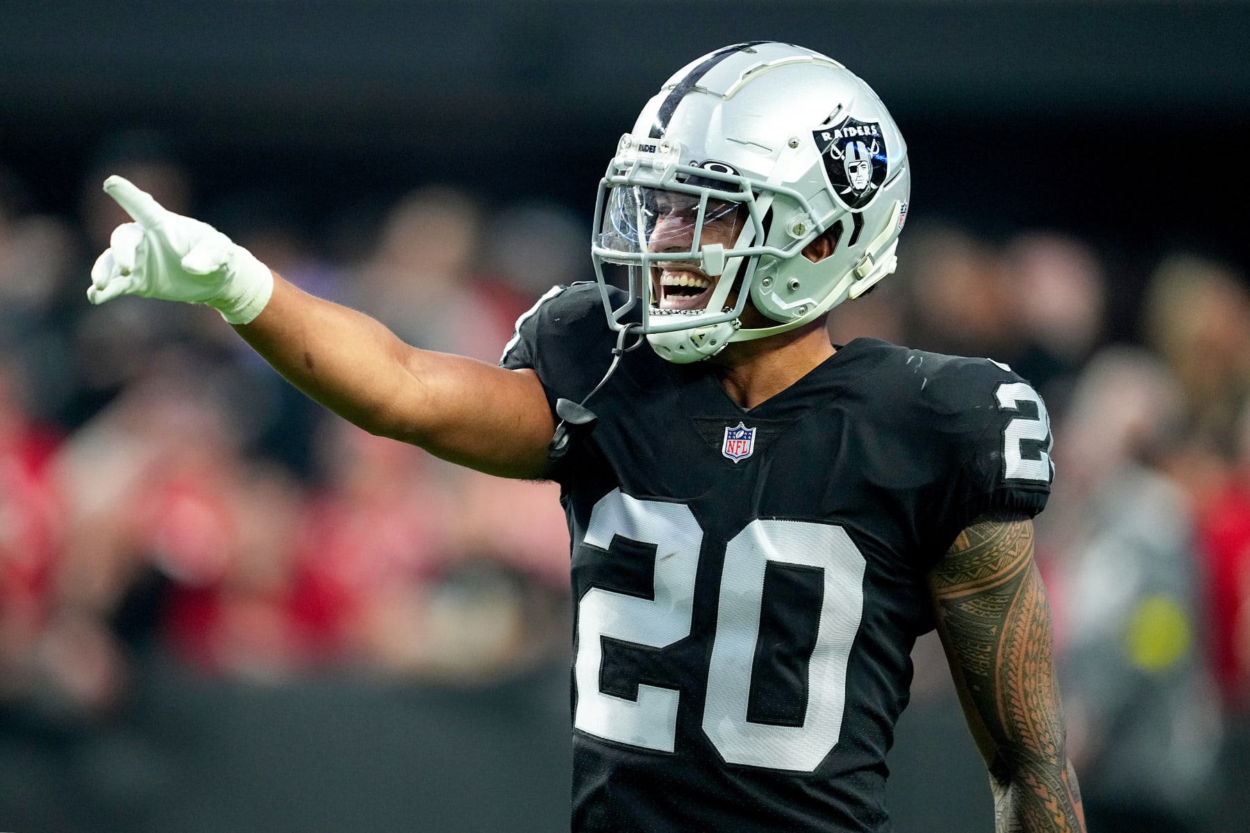 LAS VEGAS, NEVADA - JANUARY 07: Isaiah Pola-Mao #20 of the Las Vegas Raiders reacts after a play against the Kansas City Chiefs during the second half of the game at Allegiant Stadium on January 07, 2023 in Las Vegas, Nevada. (Photo by Chris Unger/Getty Images)