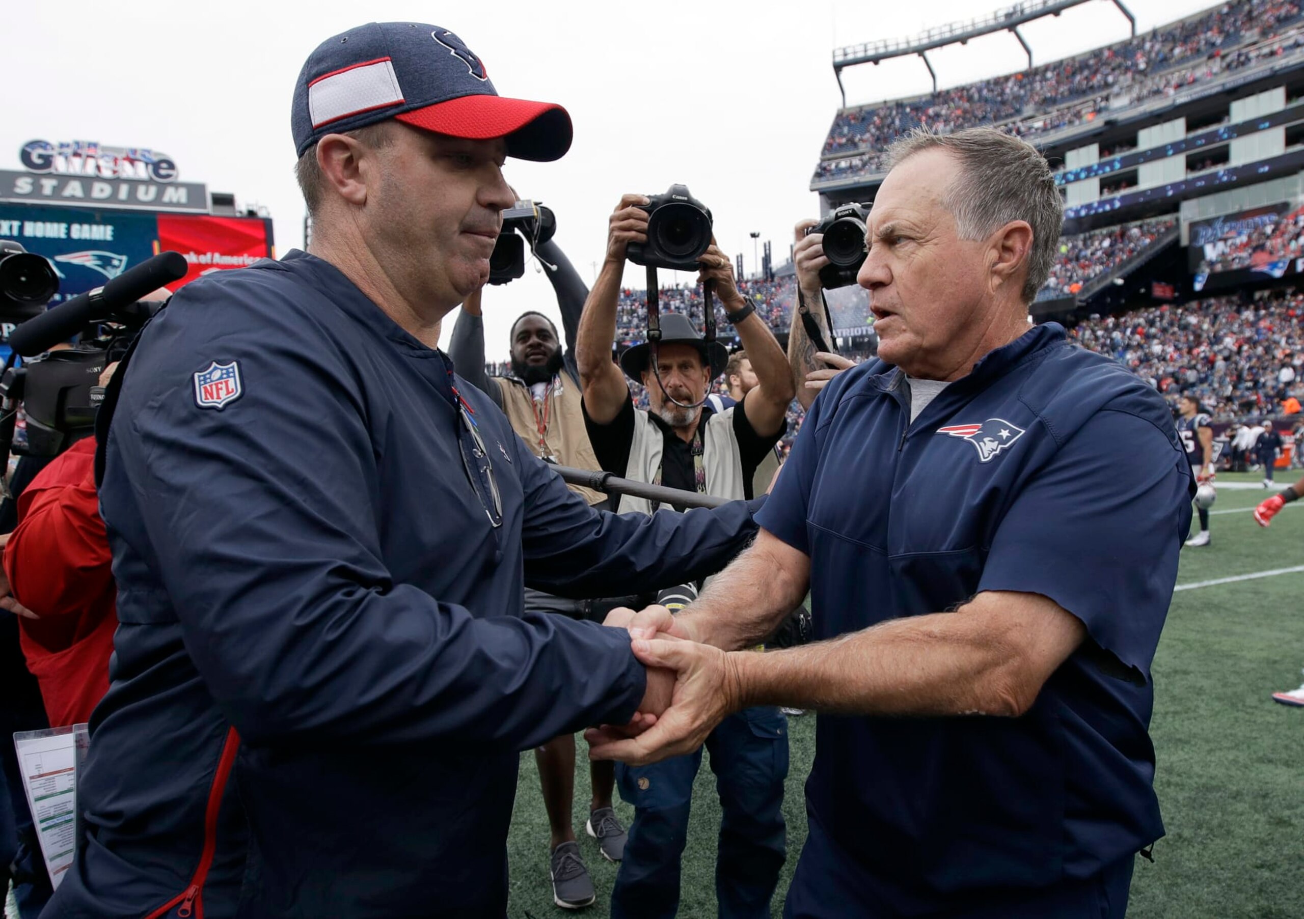 Houston Texans head coach Bill O'Brien, left, and New England Patriots head coach Bill Belichick speak at midfield after an NFL football game, Sunday, Sept. 9, 2018, in Foxborough, Mass. (AP Photo/Charles Krupa) Houston Texans head coach Bill O'Brien, left, and New England Patriots head coach Bill Belichick speak at midfield after an NFL football game, Sunday, Sept. 9, 2018, in Foxborough, Mass. (AP Photo/Charles Krupa)