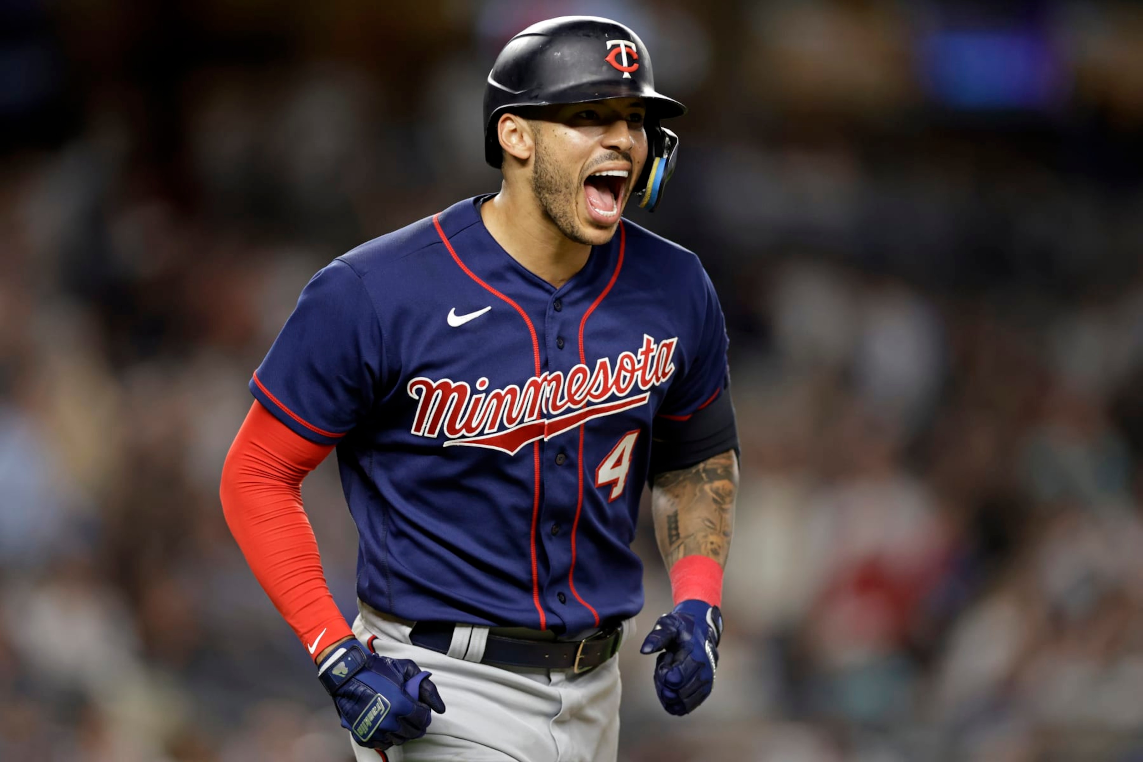 FILE - Minnesota Twins' Carlos Correa reacts after hitting a two-run home run against the New York Yankees during the eighth inning of a baseball game Thursday, Sept. 8, 2022, in New York. In a wild twist overnight, Carlos Correa agreed to a $315 million, 12-year contract with the free-spending New York Mets after his pending deal with the San Francisco Giants came apart over an issue with his physical. (AP Photo/Adam Hunger, File)