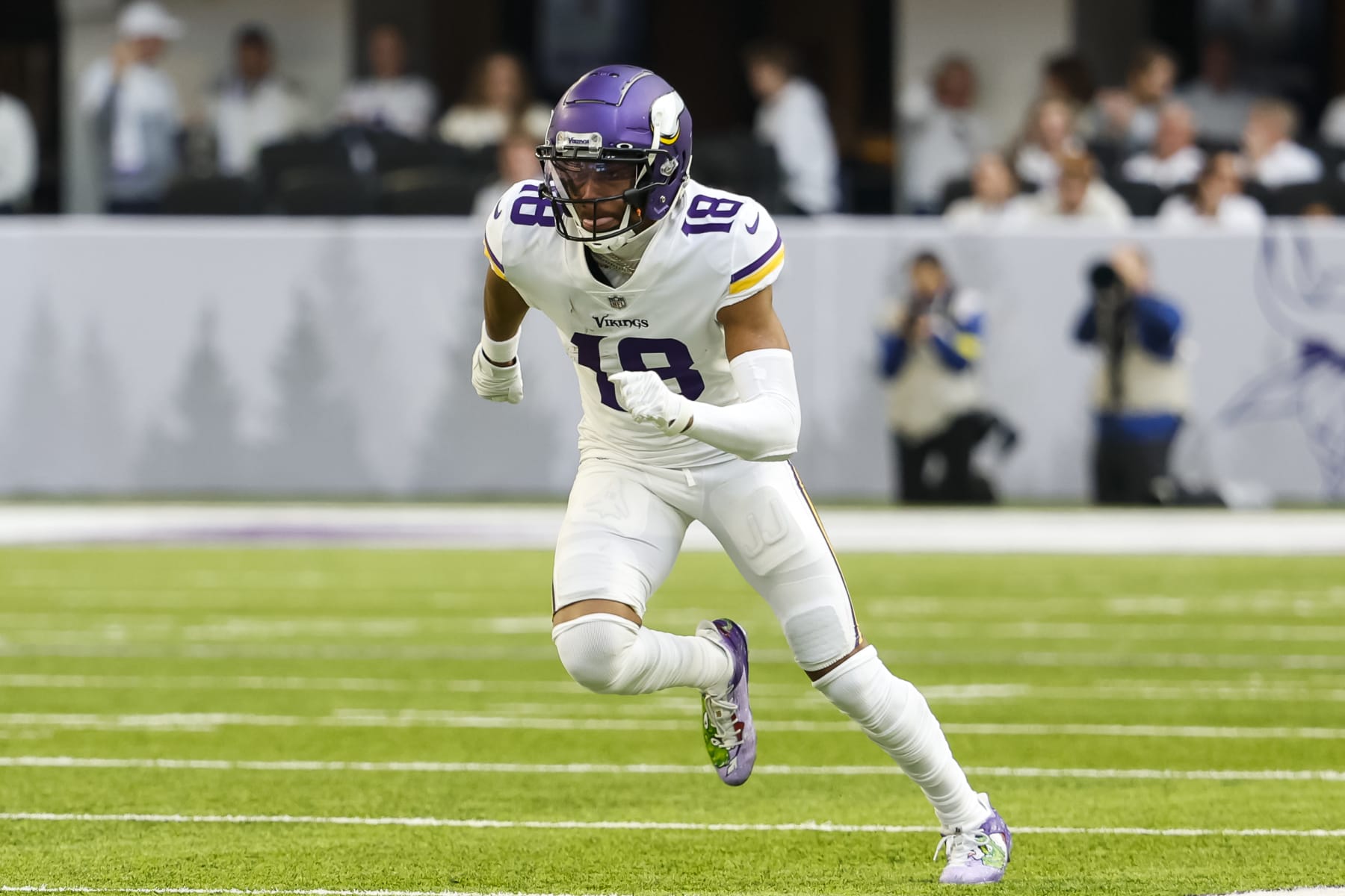 MINNEAPOLIS, MN - DECEMBER 24: Justin Jefferson #18 of the Minnesota Vikings competes against the New York Giants in the first quarter of the game at U.S. Bank Stadium on December 24, 2022 in Minneapolis, Minnesota. The Vikings defeated the Giants 27-24. (Photo by David Berding/Getty Images)