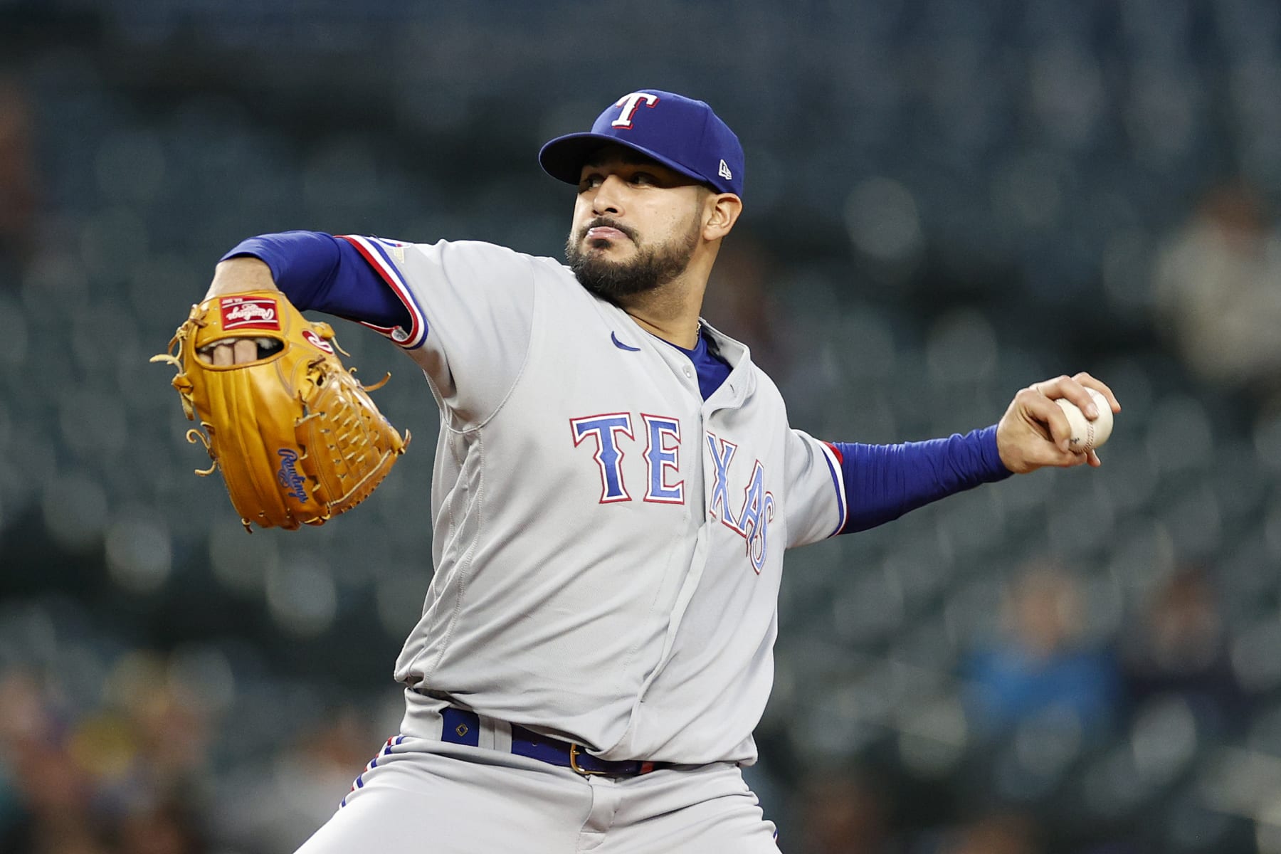 SEATTLE, WASHINGTON - SEPTEMBER 28: Martin Perez #54 of the Texas Rangers pitches during the first inning against the Seattle Mariners at T-Mobile Park on September 28, 2022 in Seattle, Washington. (Photo by Steph Chambers/Getty Images)