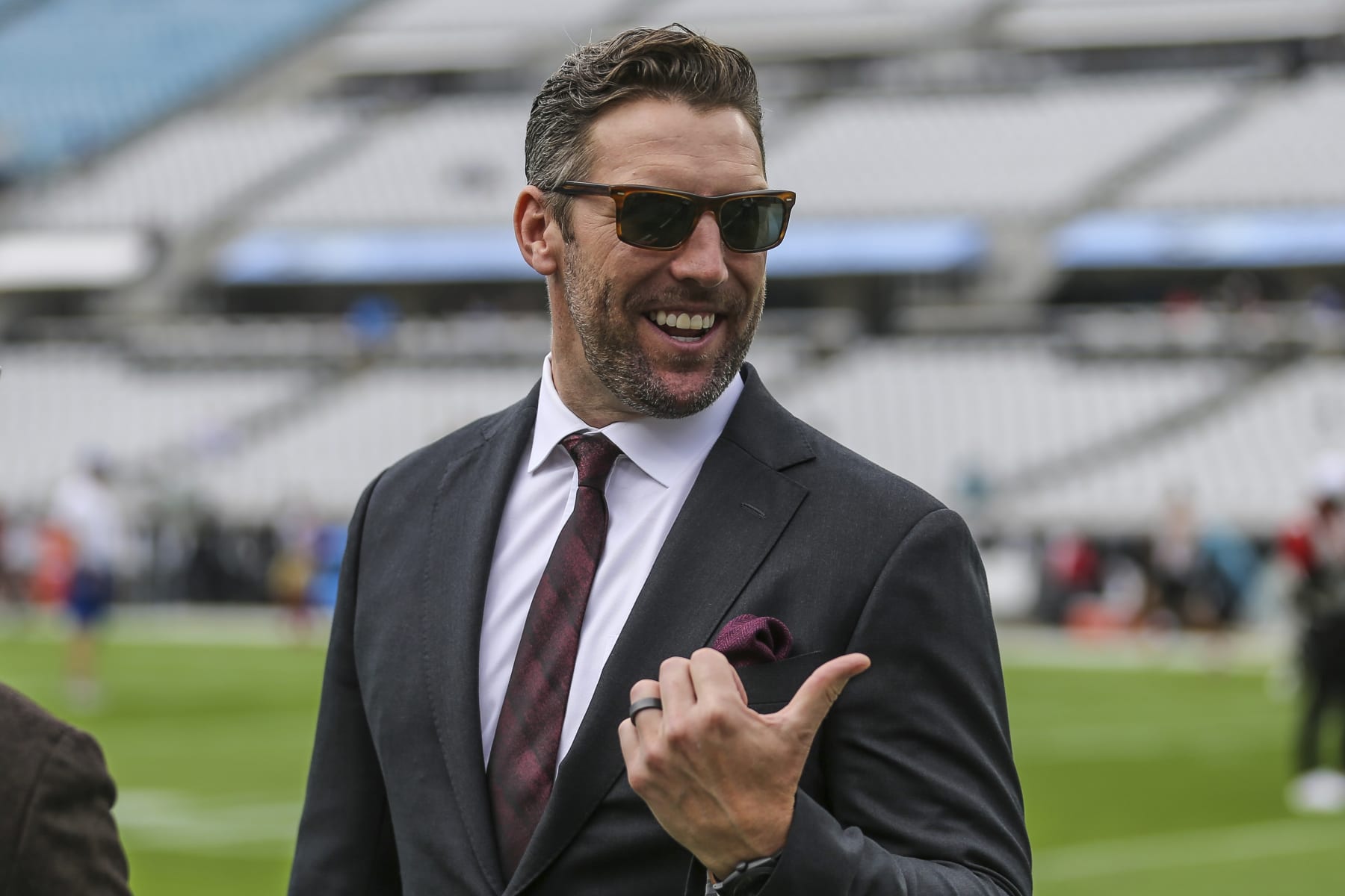 San Francisco Assistant General Manager Adam Peters walks the sideline during warm-ups before an NFL football game against the Jacksonville Jaguars, Sunday, Nov. 21, 2021, in Jacksonville, Fla. (AP Photo/Gary McCullough)