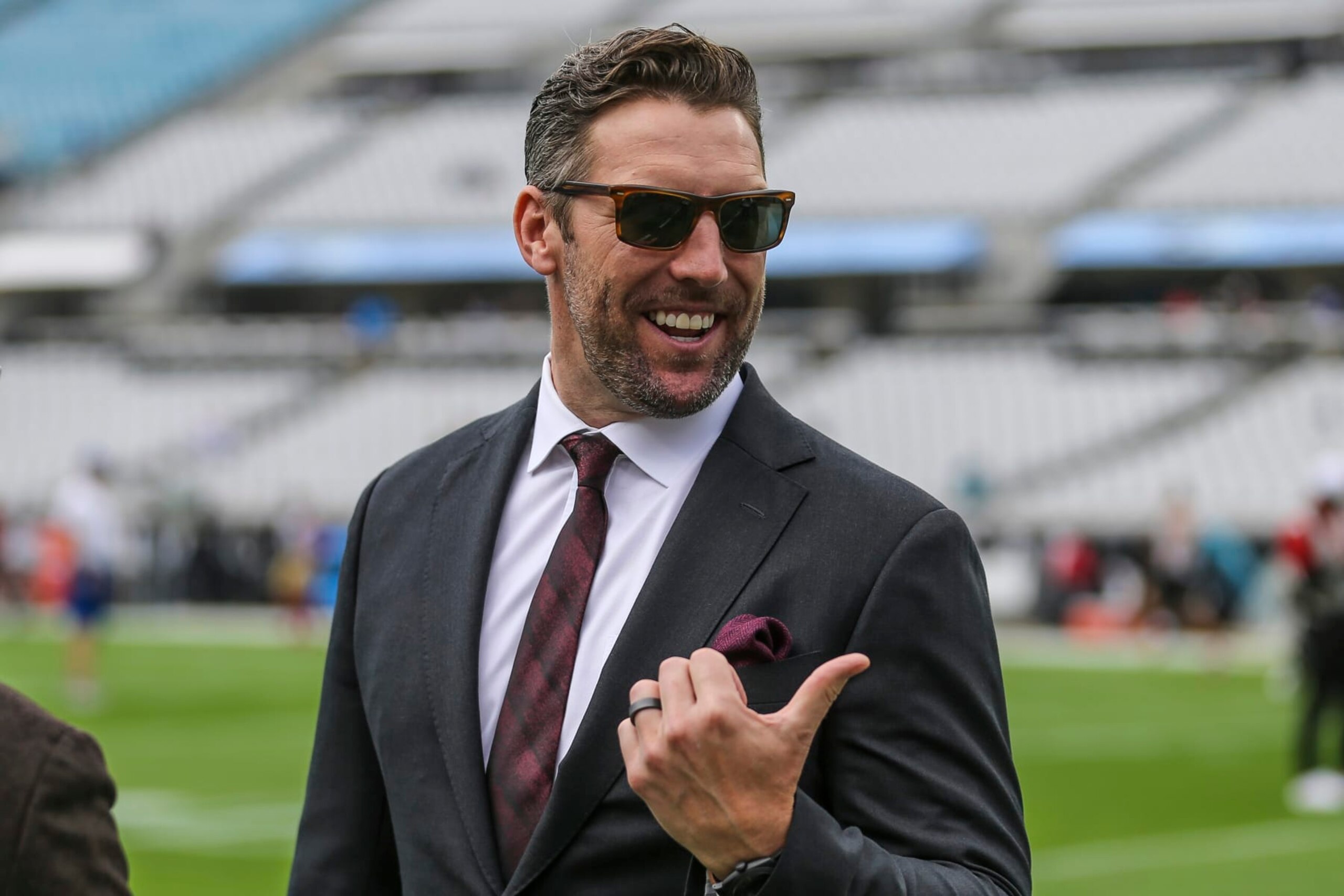 San Francisco Assistant General Manager Adam Peters walks the sideline during warm-ups before an NFL football game against the Jacksonville Jaguars, Sunday, Nov. 21, 2021, in Jacksonville, Fla. (AP Photo/Gary McCullough)