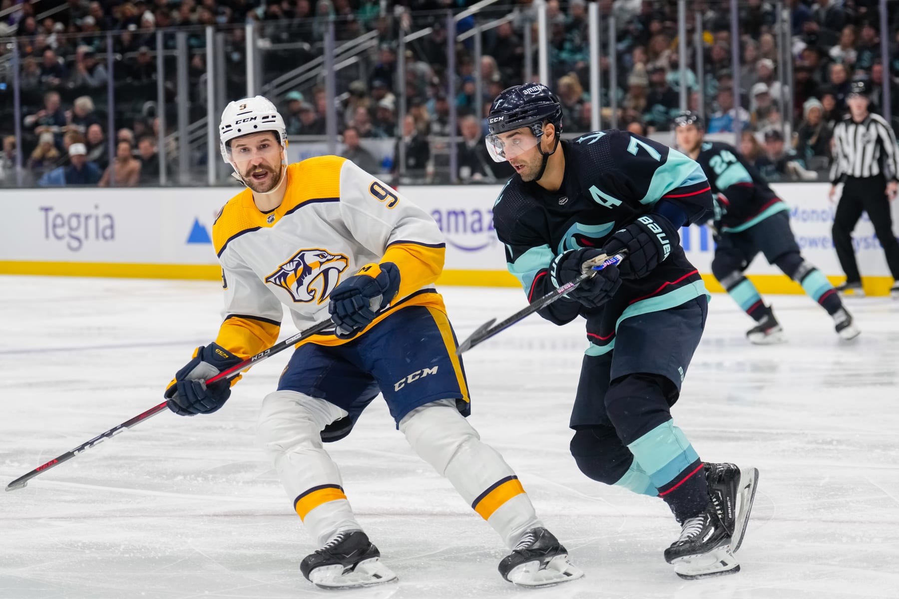 SEATTLE, WASHINGTON - NOVEMBER 08: Filip Forsberg #9 of the Nashville Predators and Jordan Eberle #7 of the Seattle Kraken skate during the second period of a game at Climate Pledge Arena on November 08, 2022 in Seattle, Washington. (Photo by Christopher Mast/NHLI via Getty Images)