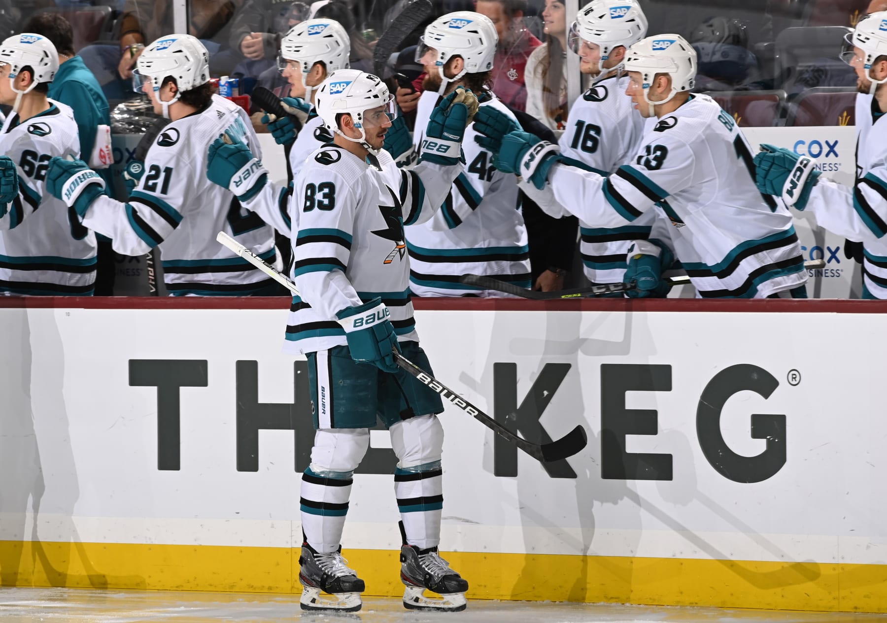 TEMPE, ARIZONA - JANUARY 10: Matt Nieto #83 of the San Jose Sharks celebrates with teammates on the bench after scoring a goal during the third period against the Arizona Coyotes at Mullett Arena on January 10, 2023 in Tempe, Arizona. (Photo by Norm Hall/NHLI via Getty Images)