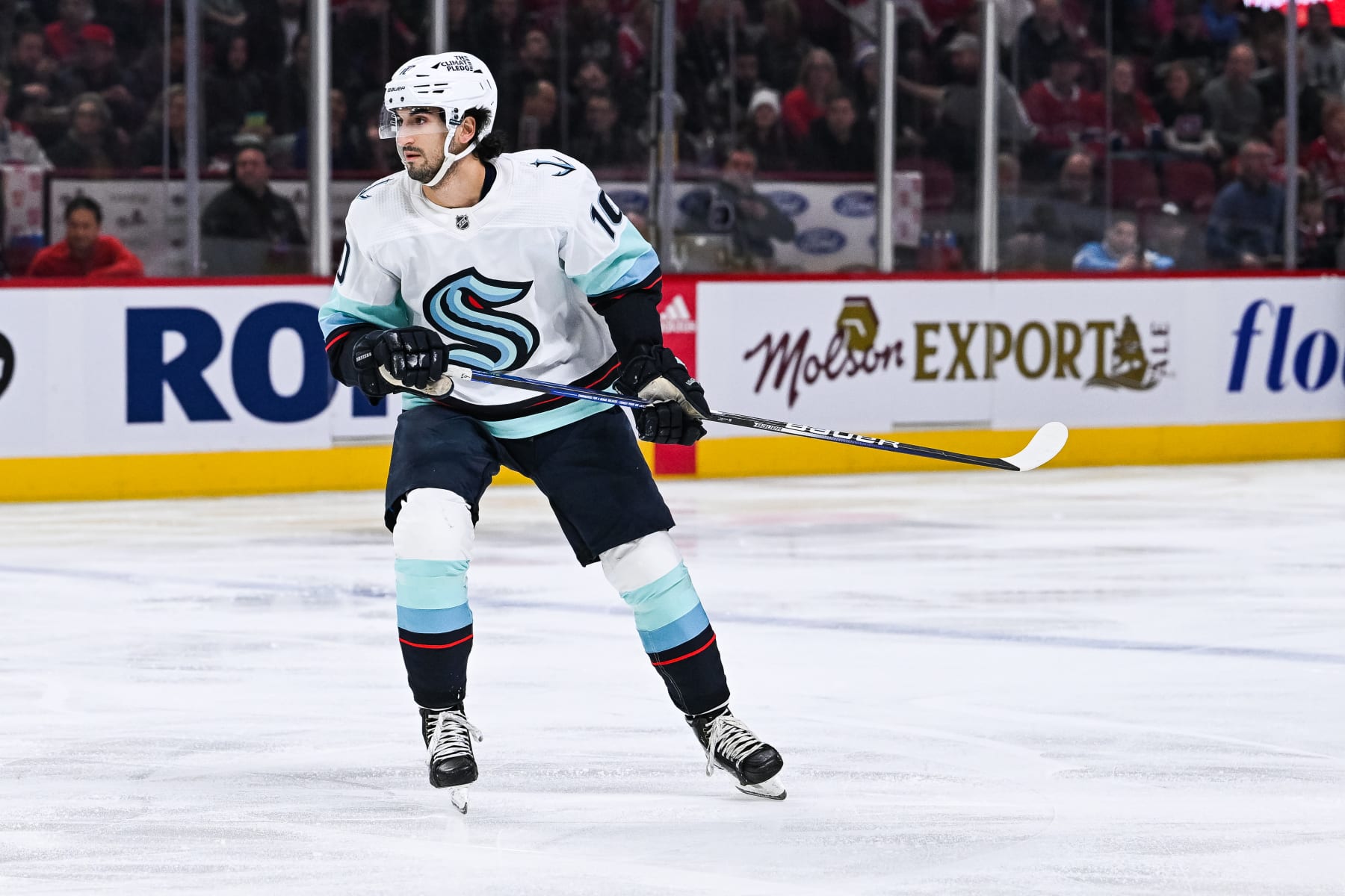 MONTREAL, QC - JANUARY 09: Seattle Kraken center Matty Beniers (10) tracks the play during the Seattle Kraken versus the Montreal Canadiens game on January 09, 2023, at Bell Centre in Montreal, QC (Photo by David Kirouac/Icon Sportswire via Getty Images)