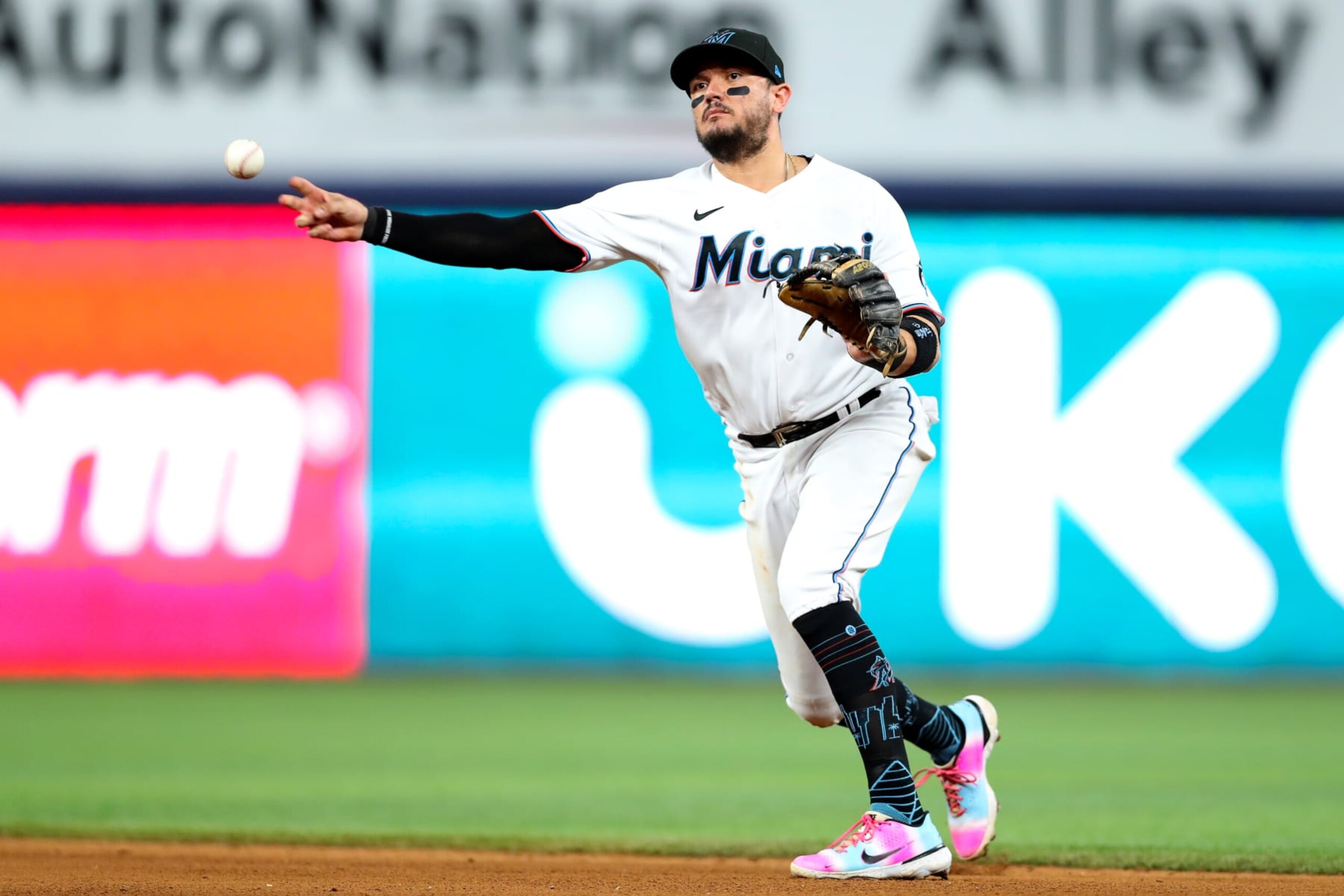 MIAMI, FLORIDA - OCTOBER 03: Miguel Rojas #11 of the Miami Marlins throws to first base during the eighth inning against the Atlanta Braves at loanDepot park on October 03, 2022 in Miami, Florida. (Photo by Megan Briggs/Getty Images) MIAMI, FLORIDA - OCTOBER 03: Miguel Rojas #11 of the Miami Marlins throws to first base during the eighth inning against the Atlanta Braves at loanDepot park on October 03, 2022 in Miami, Florida. (Photo by Megan Briggs/Getty Images)