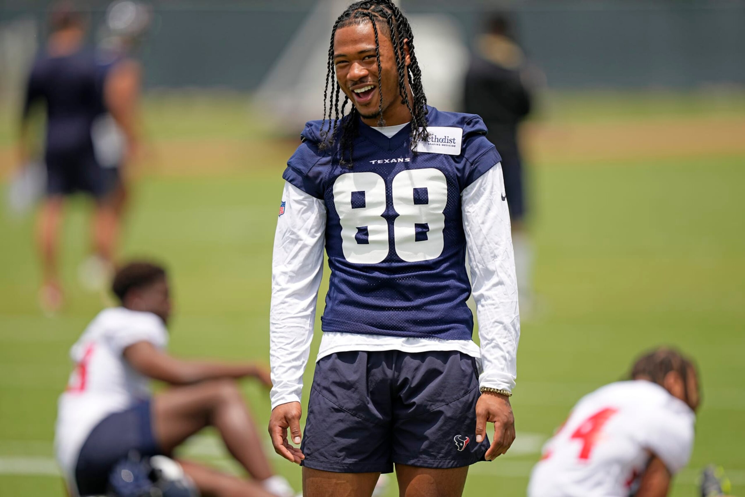 Houston Texans' John Metchie III smiles during an NFL football rookie minicamp practice Friday, May 13, 2022, in Houston. (AP Photo/David J. Phillip)