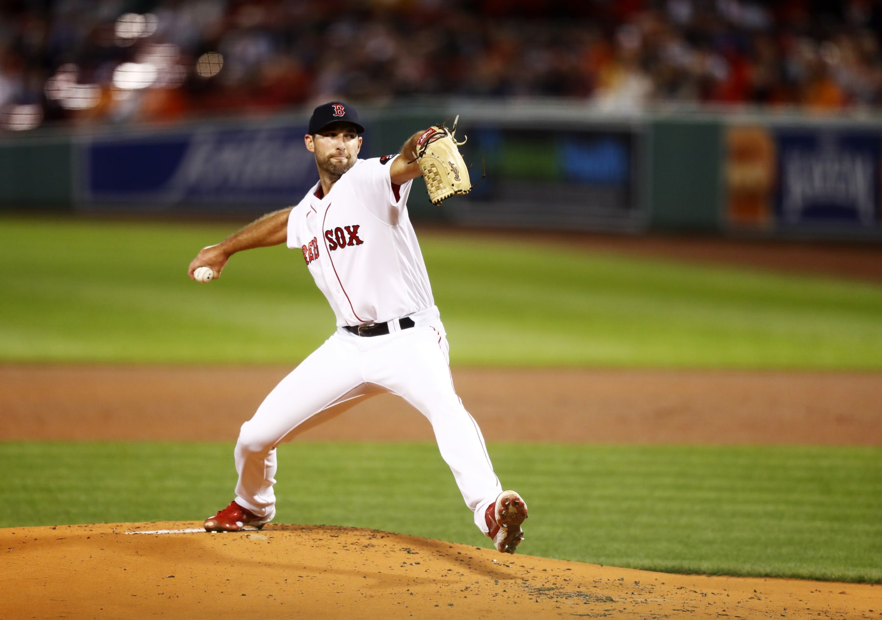 BOSTON, MASSACHUSETTS - SEPTEMBER 27: Starting pitcher Michael Wacha #52 of the Boston Red Sox pitches in the top of first inning of the game against the Baltimore Orioles at Fenway Park on September 27, 2022 in Boston, Massachusetts. (Photo by Omar Rawlings/Getty Images)