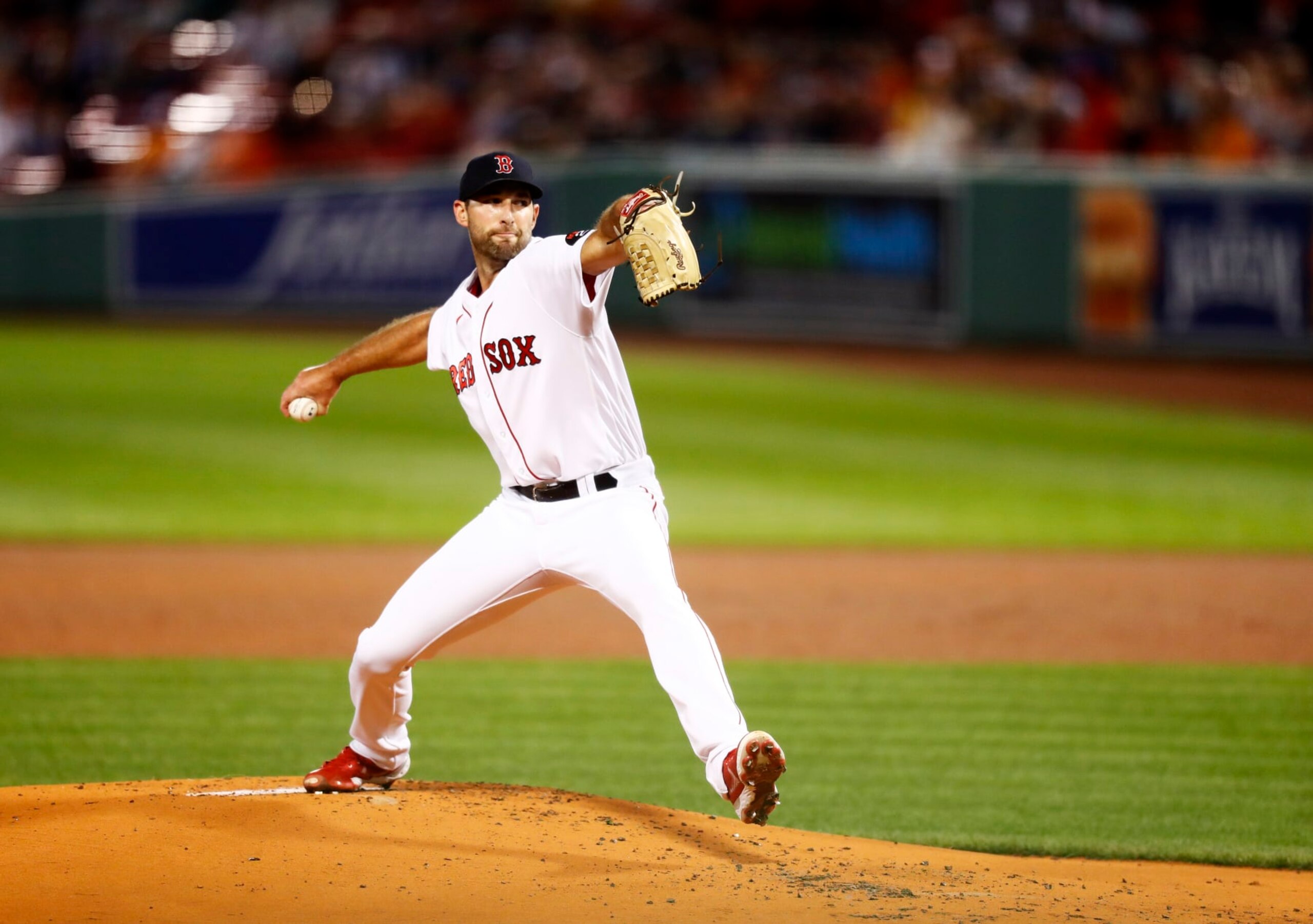 BOSTON, MASSACHUSETTS - SEPTEMBER 27: Starting pitcher Michael Wacha #52 of the Boston Red Sox pitches in the top of first inning of the game against the Baltimore Orioles at Fenway Park on September 27, 2022 in Boston, Massachusetts. (Photo by Omar Rawlings/Getty Images)