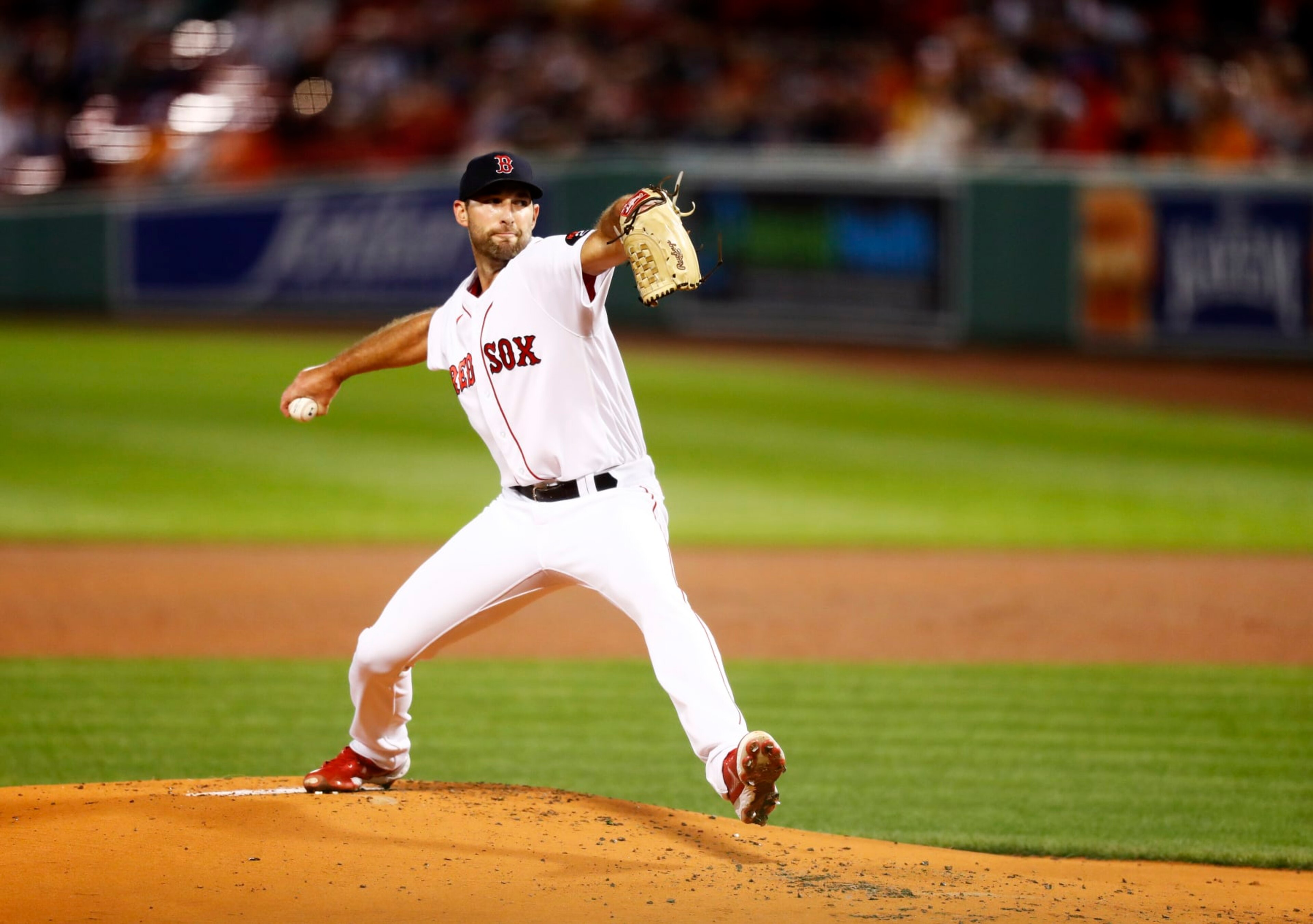BOSTON, MASSACHUSETTS - SEPTEMBER 27: Starting pitcher Michael Wacha #52 of the Boston Red Sox pitches in the top of first inning of the game against the Baltimore Orioles at Fenway Park on September 27, 2022 in Boston, Massachusetts. (Photo by Omar Rawlings/Getty Images)