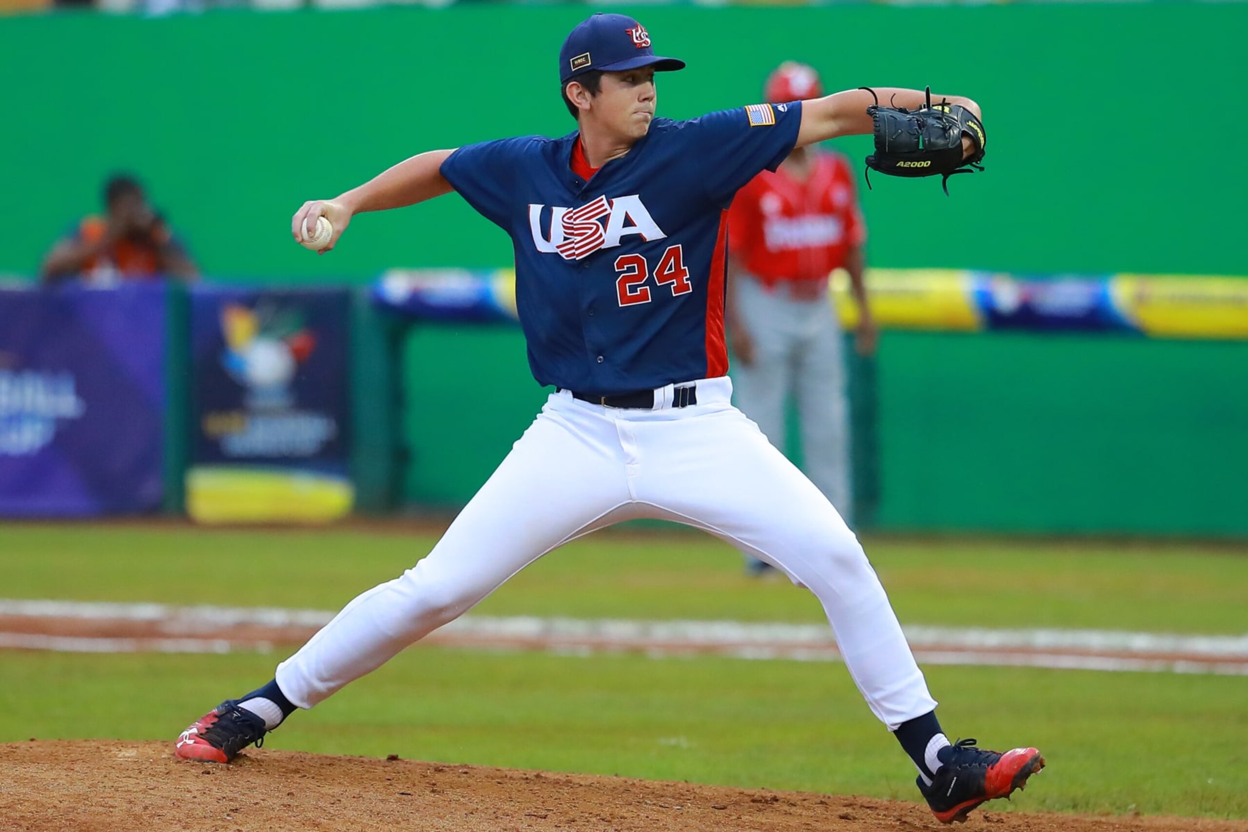 DAVID, PANAMA - AUGUST 19: Andrew Painter #24 of United States pitches in the 1st inning during the final match of WSBC U-15 World Cup Super Round  at Estadio Kenny Serracin on August 19, 2018 in David, Panama. (Photo by Hector Vivas/Getty Images)